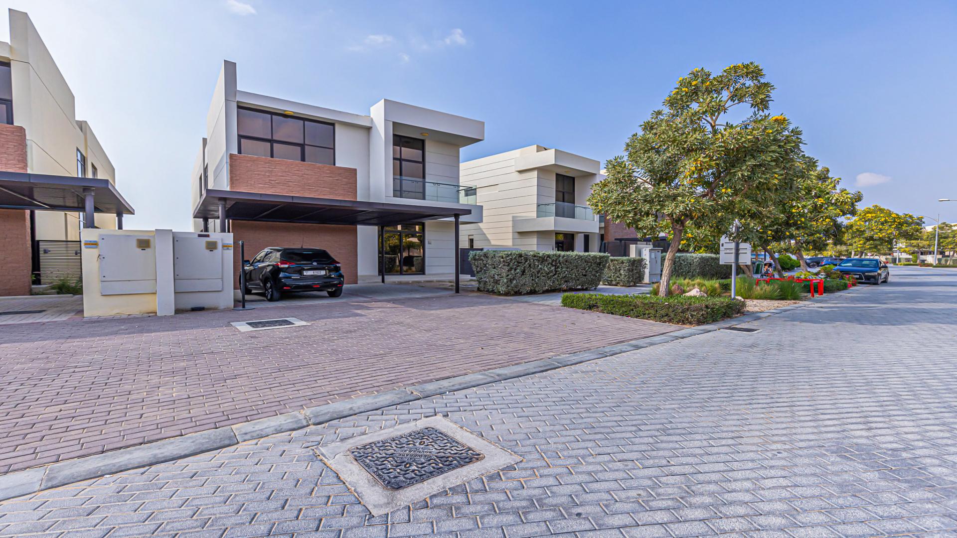 Luxurious living room in fully furnished villa, Damac Hills, Flora community, golf course view