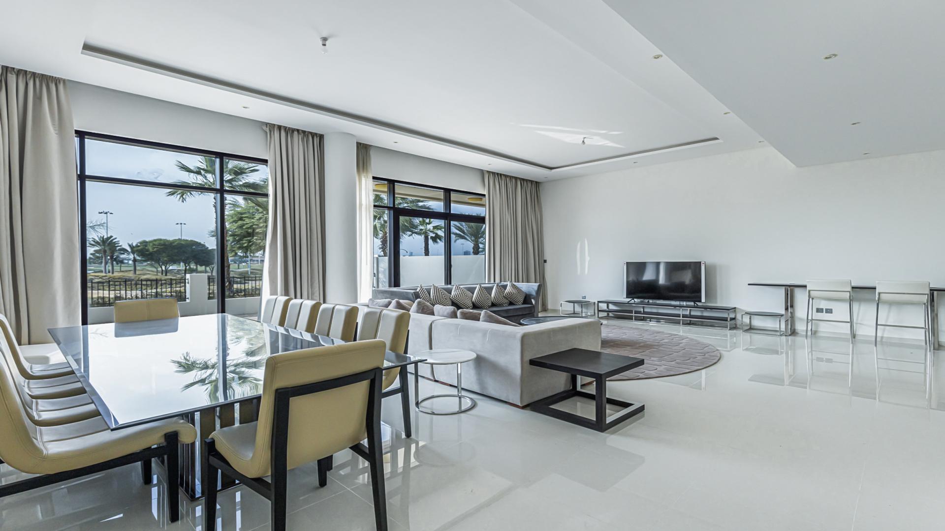 Modern single row villa exterior in Damac Hills' Flora community, available for sale