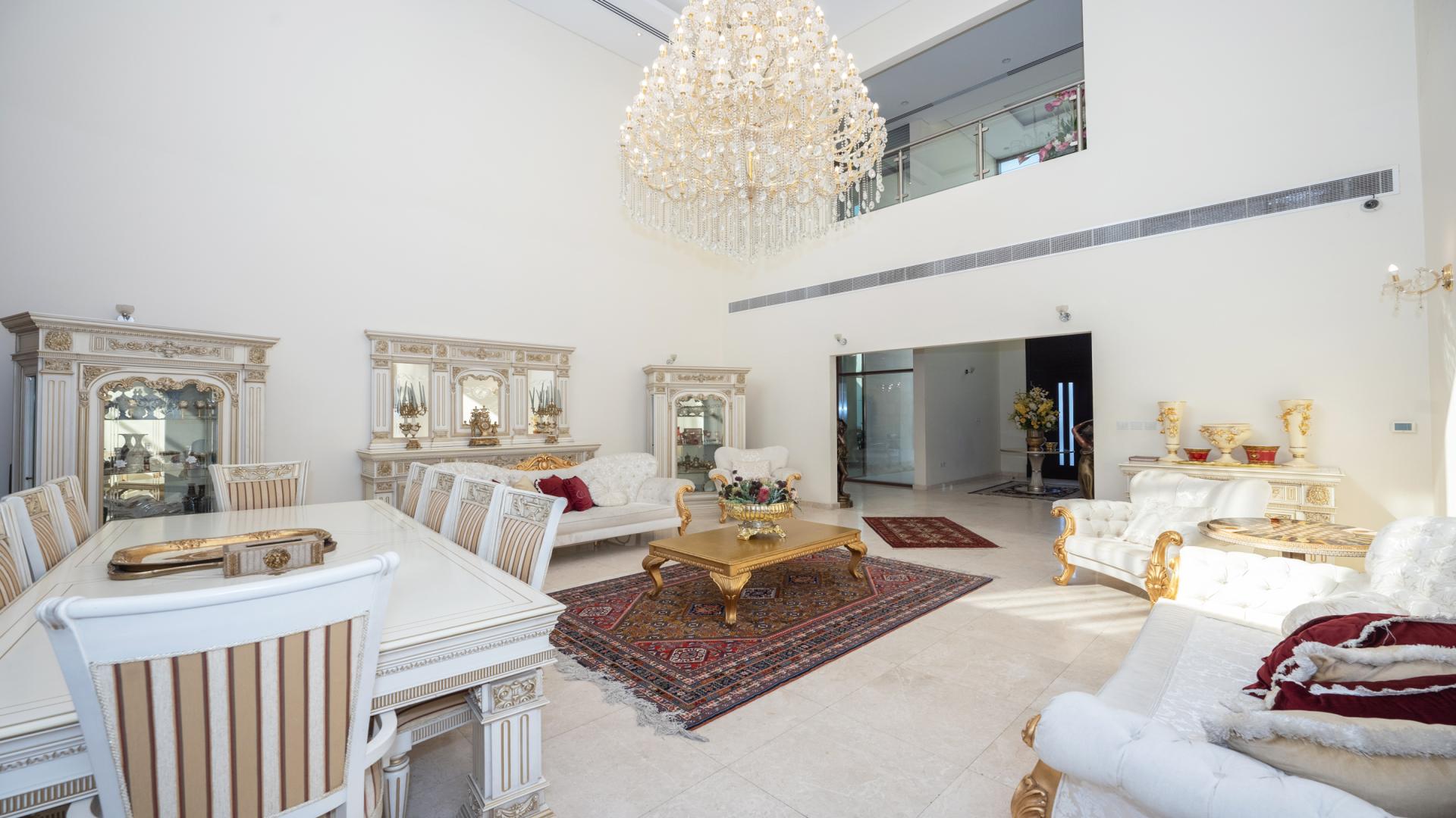 Luxurious chandelier in elegant villa dining room, Meydan Gated Community, spacious and opulent design