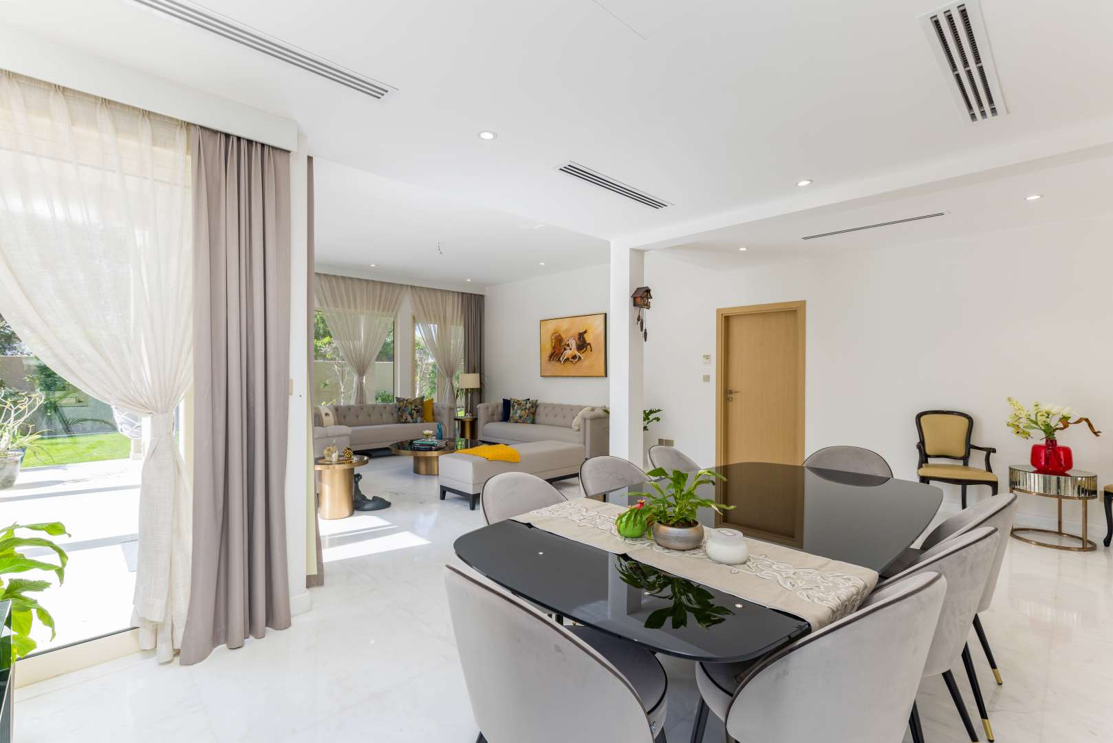 Luxurious living and dining area in upgraded Saheel villa, Arabian Ranches 1
