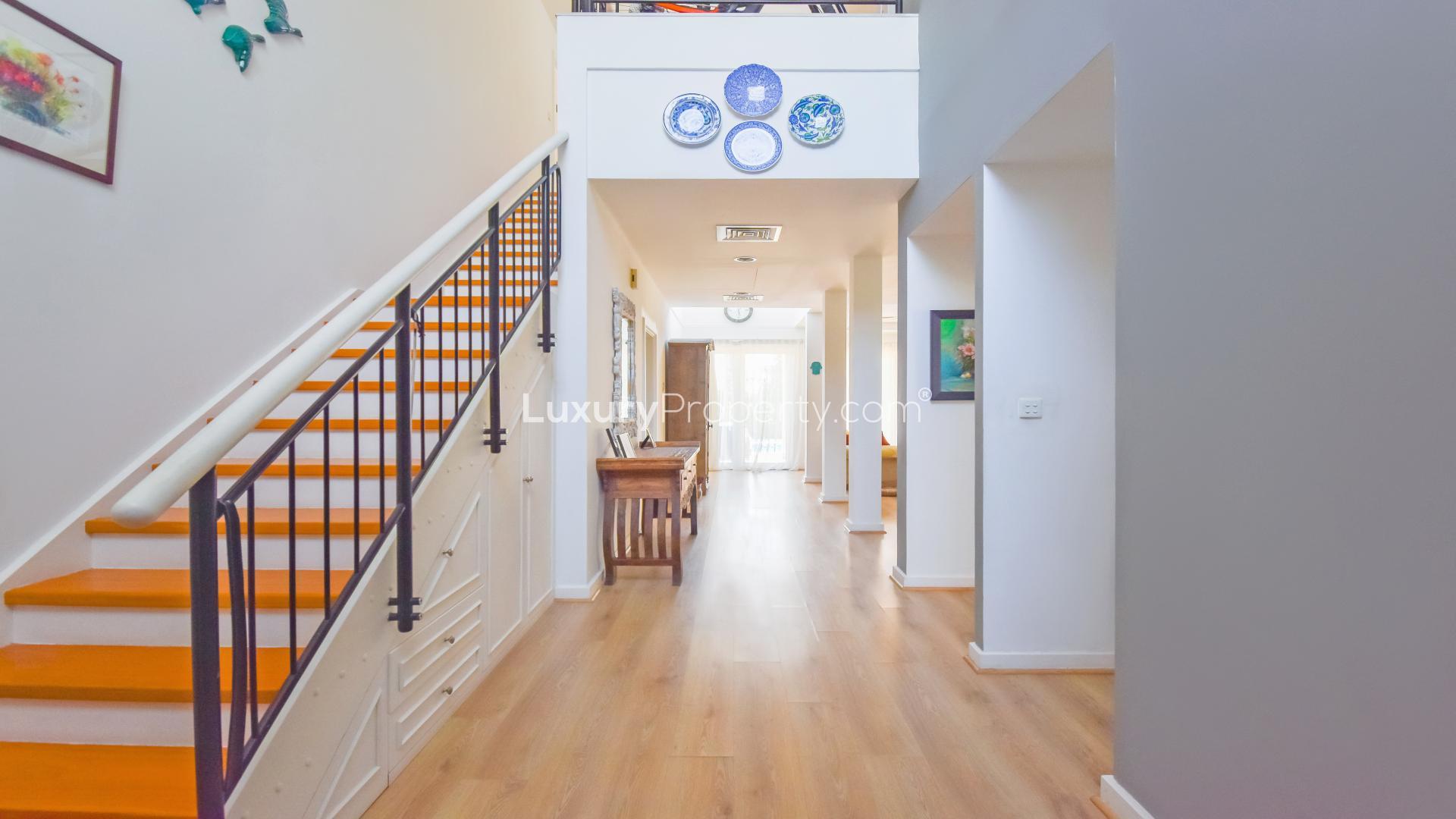 Upgraded 5-bedroom villa exterior with garden in Saheel, Arabian Ranches Golf Course