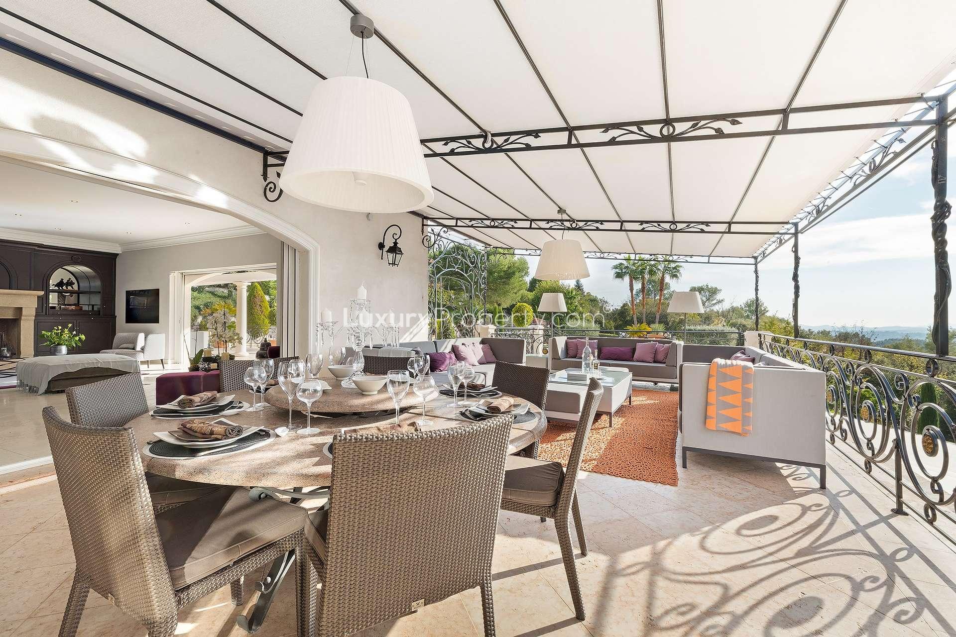 Outdoor terrace with modern seating in renovated St Paul de Vence villa, French Riviera