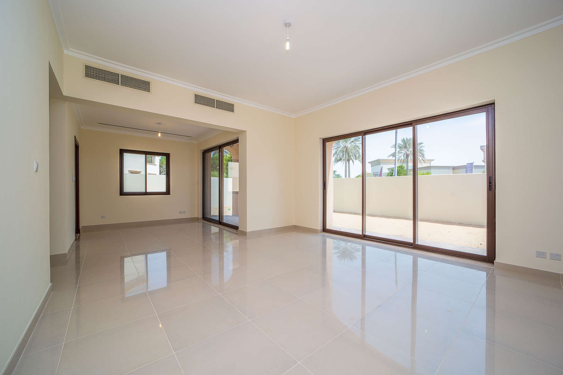 Empty bedroom with tiled floor and window in Samara villa, Arabian Ranches 2