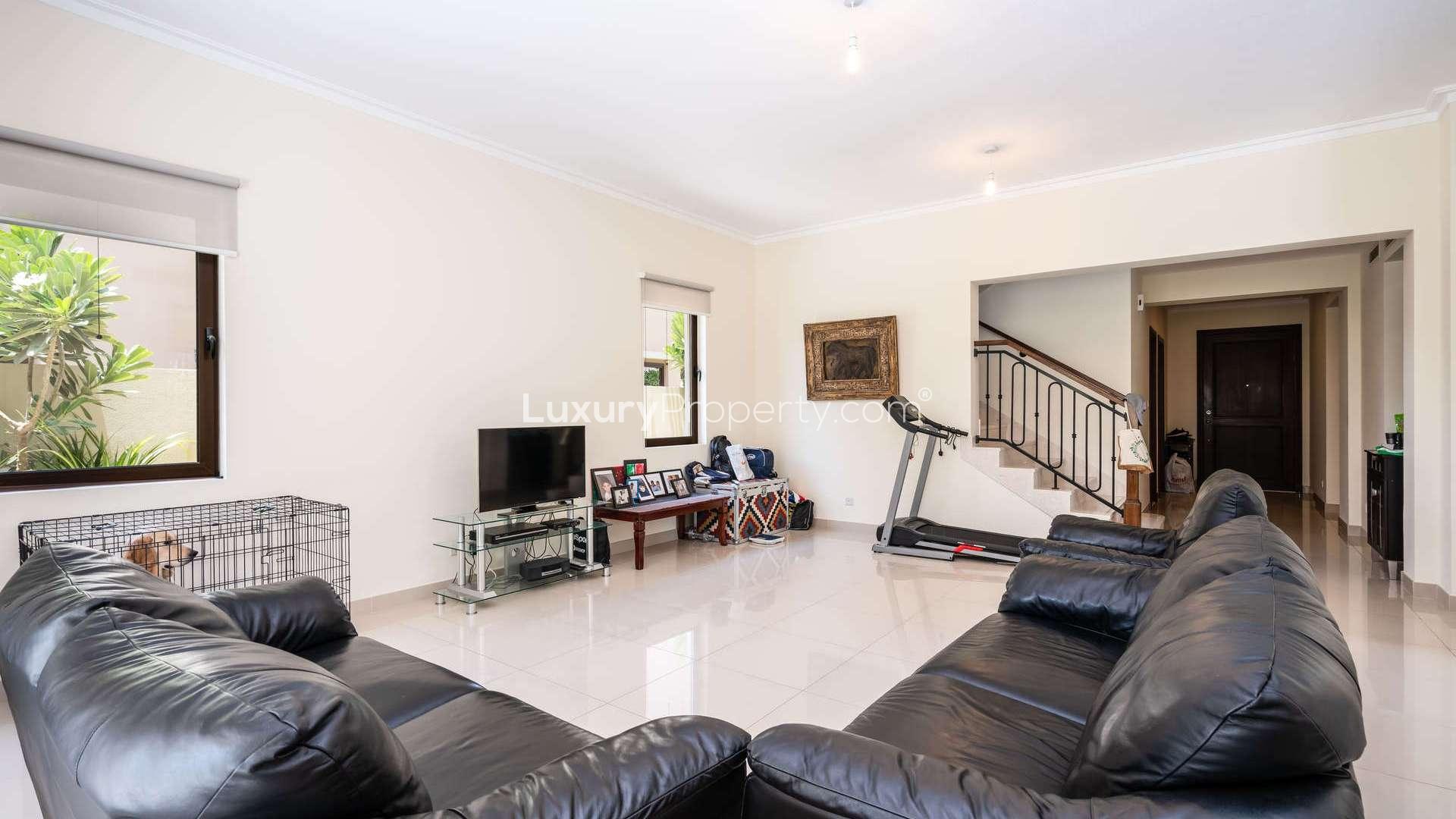 Dining area with garden view in five-bedroom villa, Samara, Arabian Ranches 2