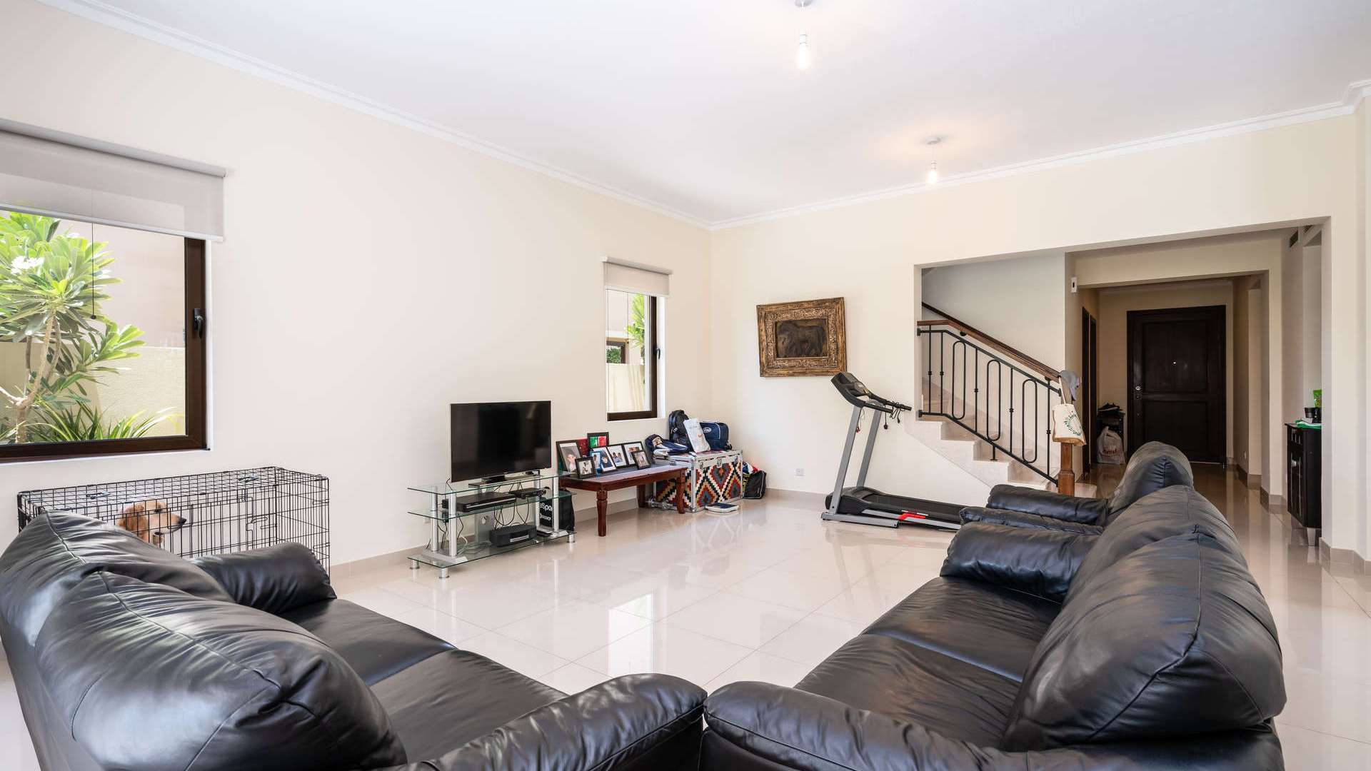 Dining area with garden view in five-bedroom villa, Samara, Arabian Ranches 2