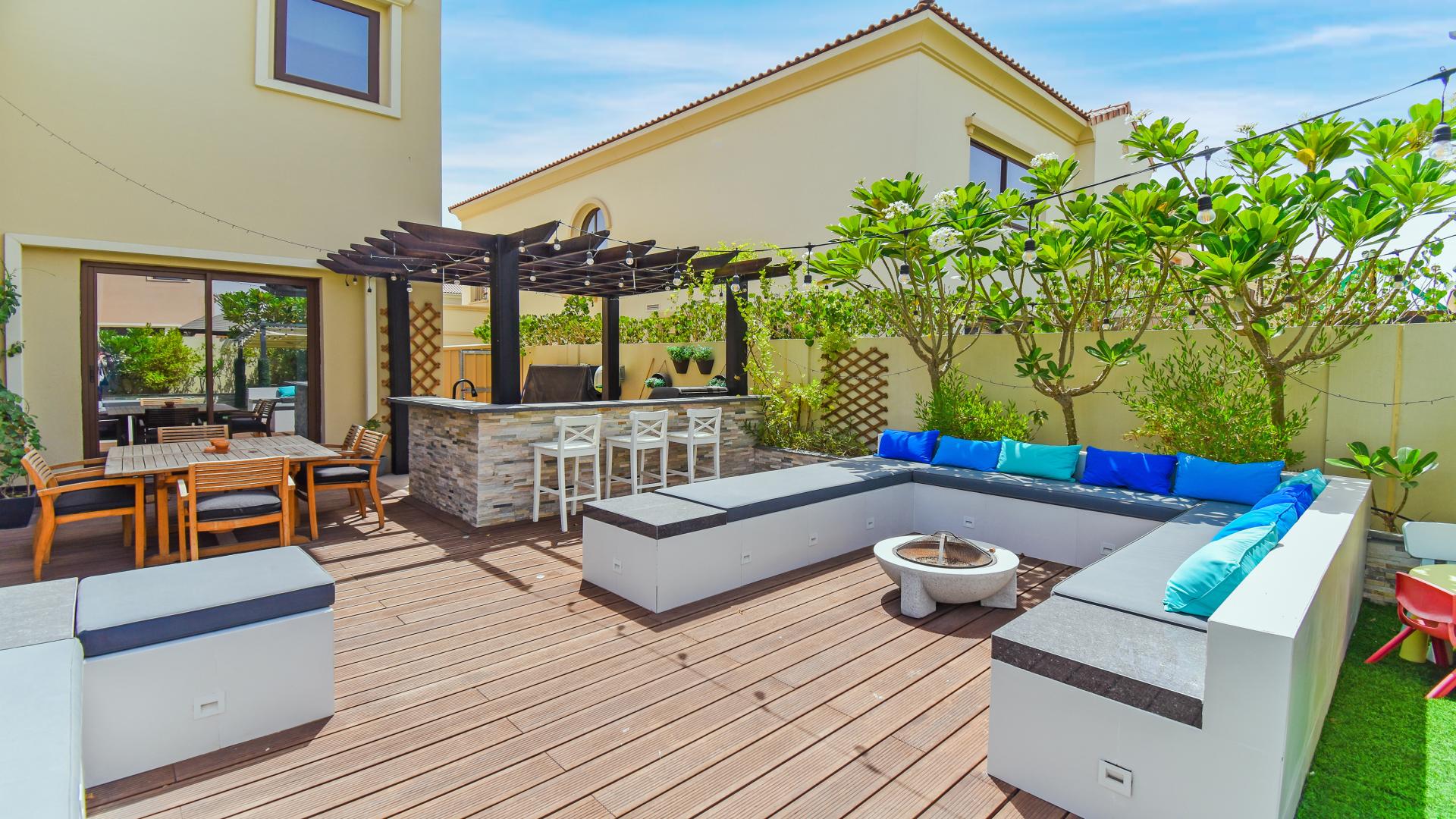 Outdoor kitchen and dining area in Samara villa, Arabian Ranches 2, family-friendly amenities