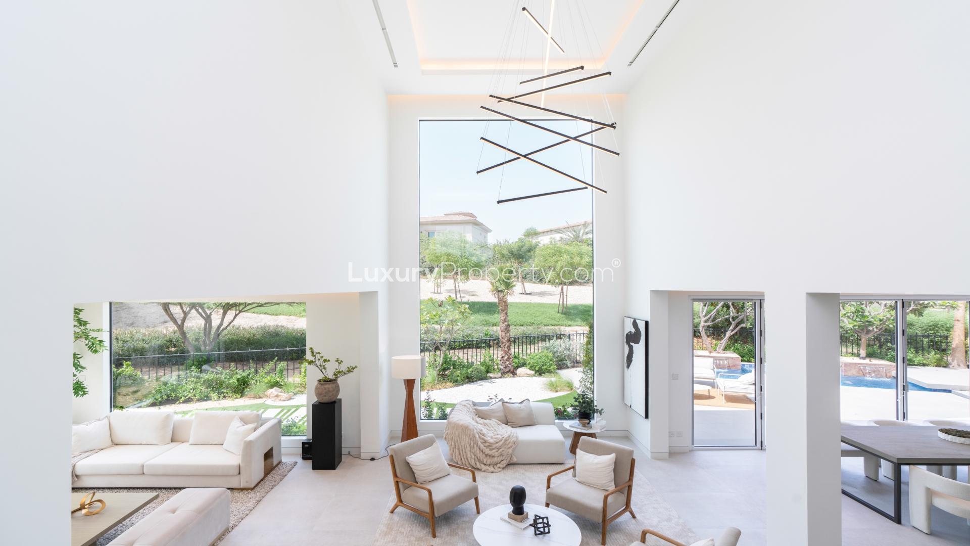 Luxurious living room in Mediterranean villa, Jumeirah Islands, with park views and elegant decor