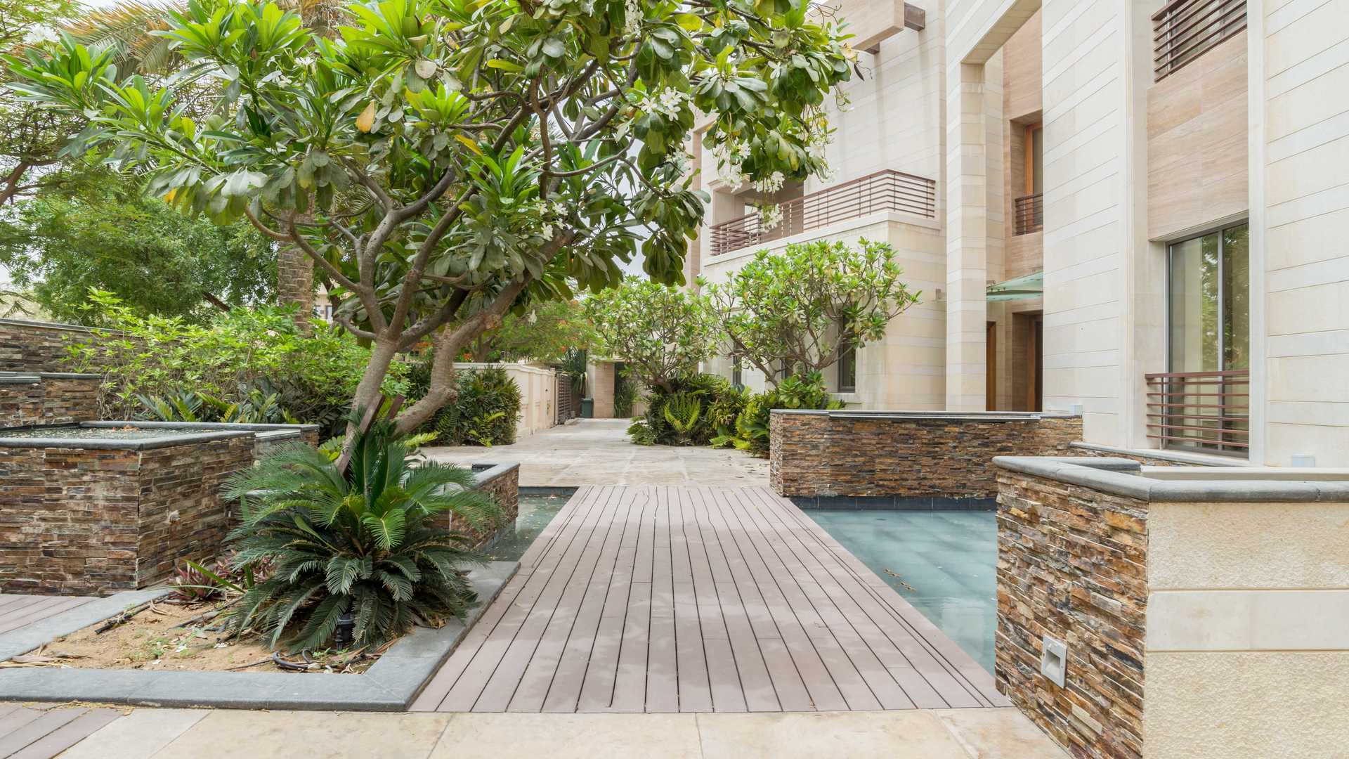 Exterior view of luxury 5-bed villa with garden in Emirates Hills, Sector P