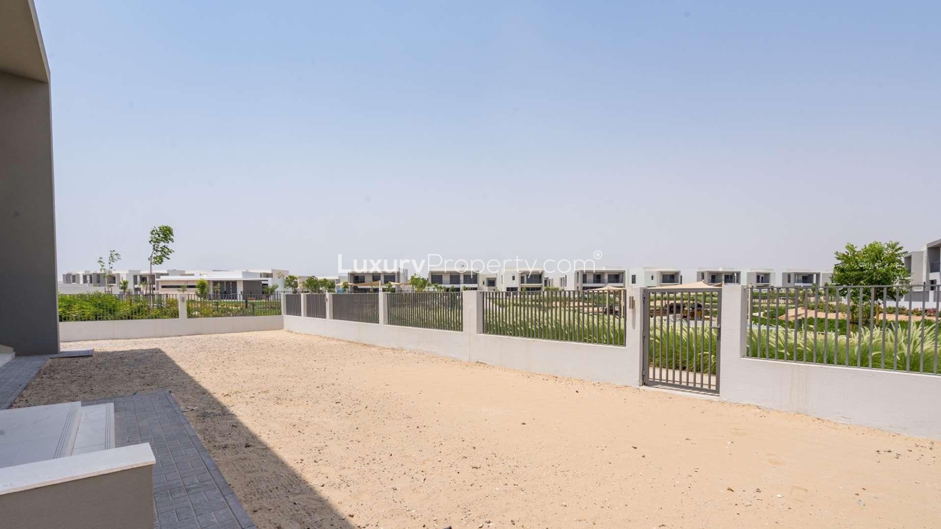 Interior view of spacious villa with large sliding glass doors in Sidra, Dubai Hills Estate