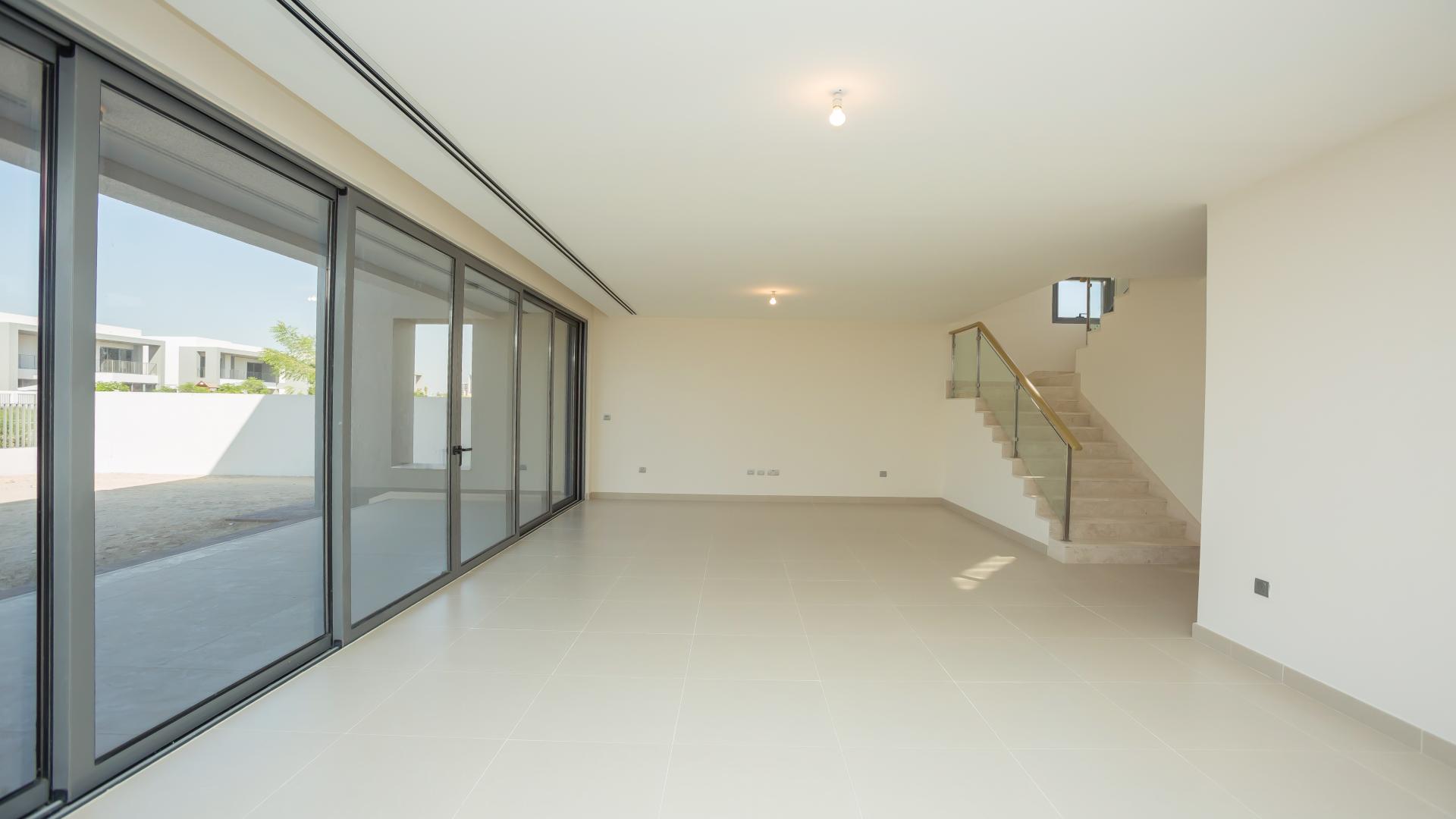 Modern 5-bedroom villa exterior in Sidra, Dubai Hills Estate, with landscaped garden