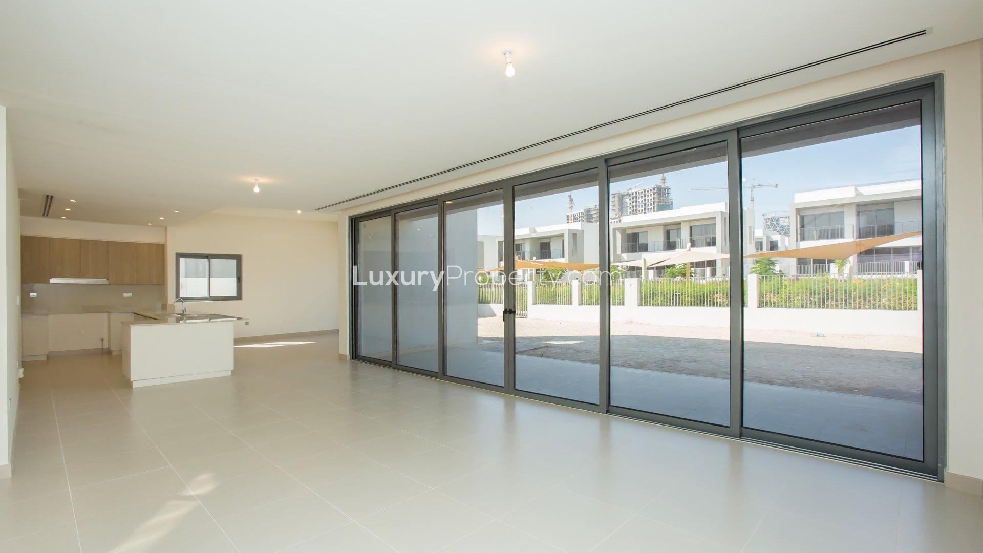 Spacious living area with large windows in Sidra Villa, Dubai Hills Estate