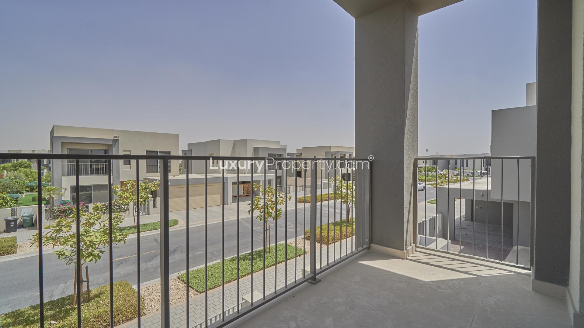 Balcony view from 5-bedroom villa in Sidra Villas, Dubai Hills Estate, showing street and skyline