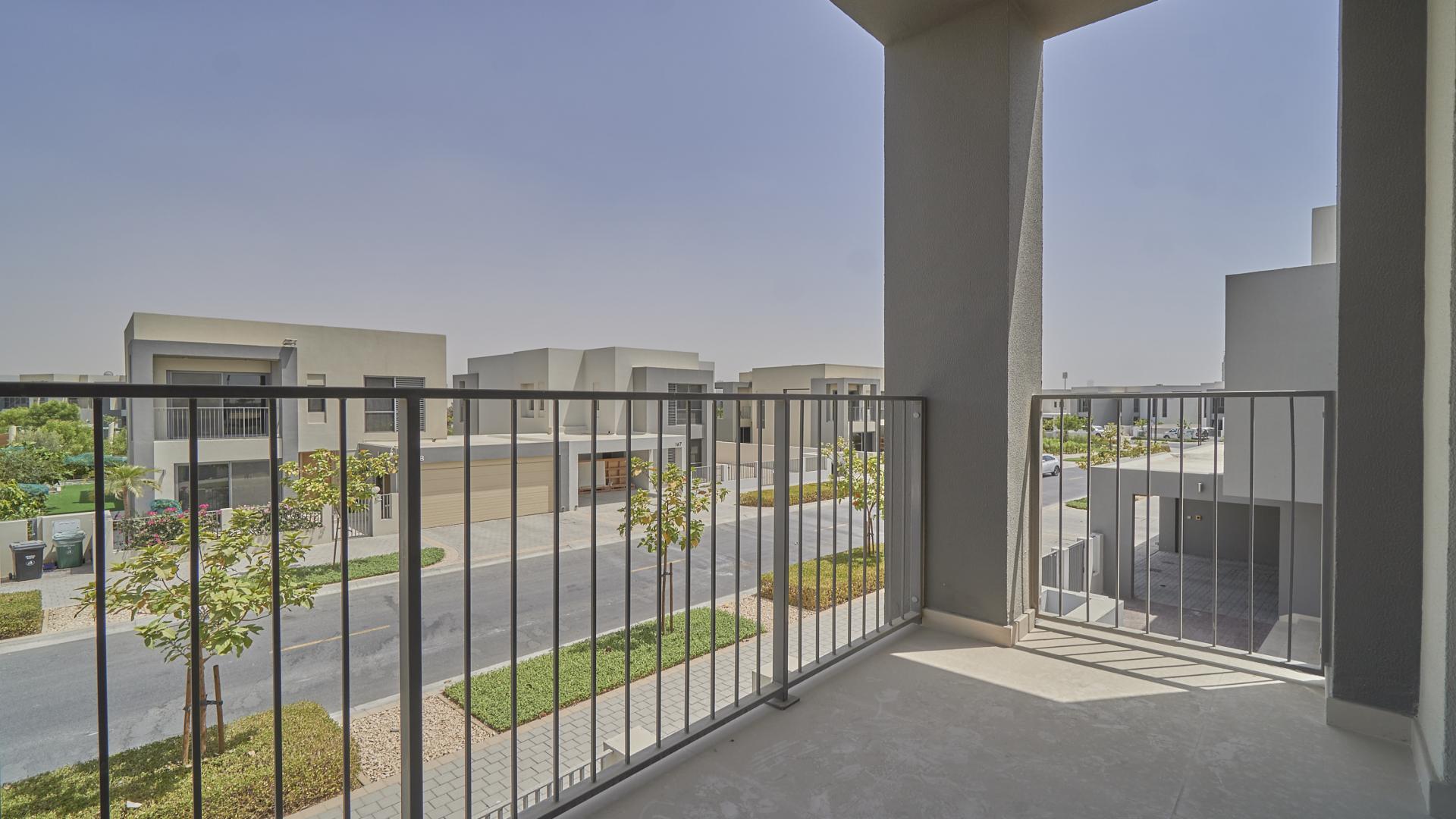 Balcony view from 5-bedroom villa in Sidra Villas, Dubai Hills Estate, showing street and skyline