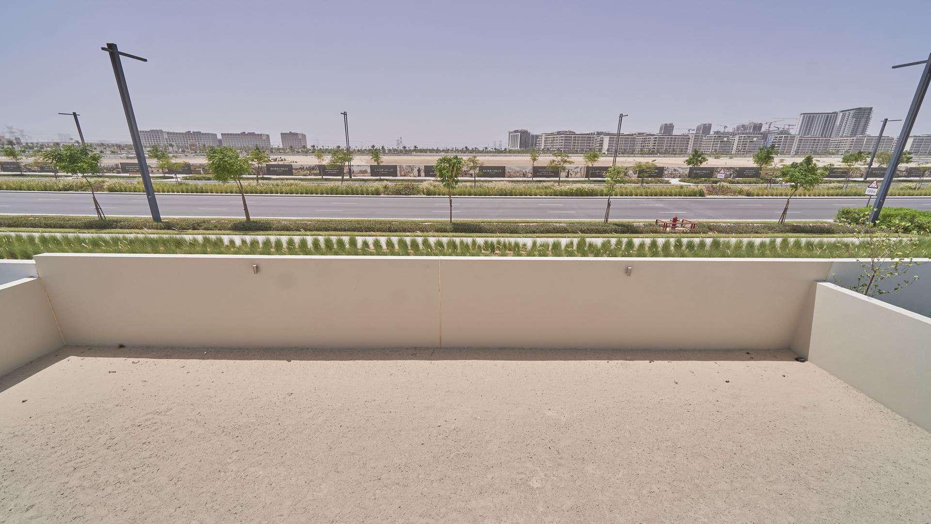 Spacious living room with large windows in Sidra Villas, Dubai Hills Estate