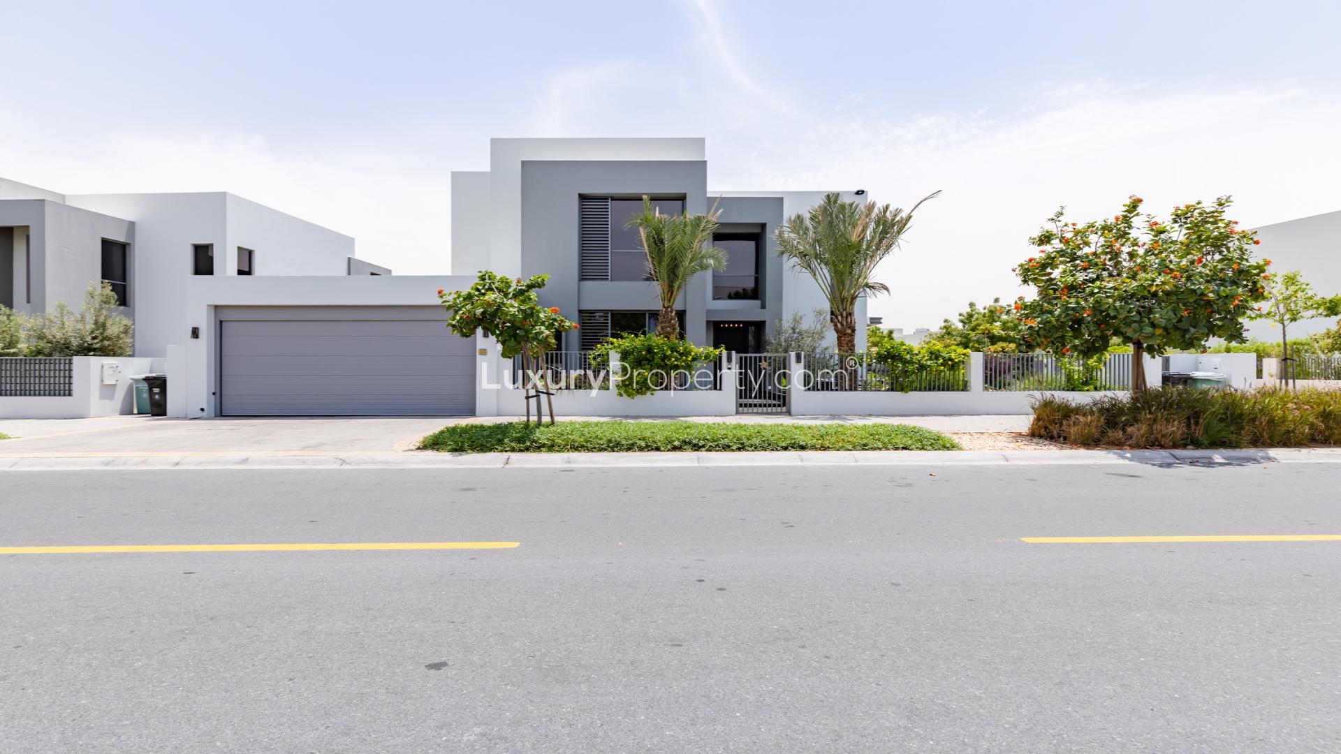 Modern E5 Villa in Sidra 1, Dubai Hills Estate, surrounded by lush greenery and road