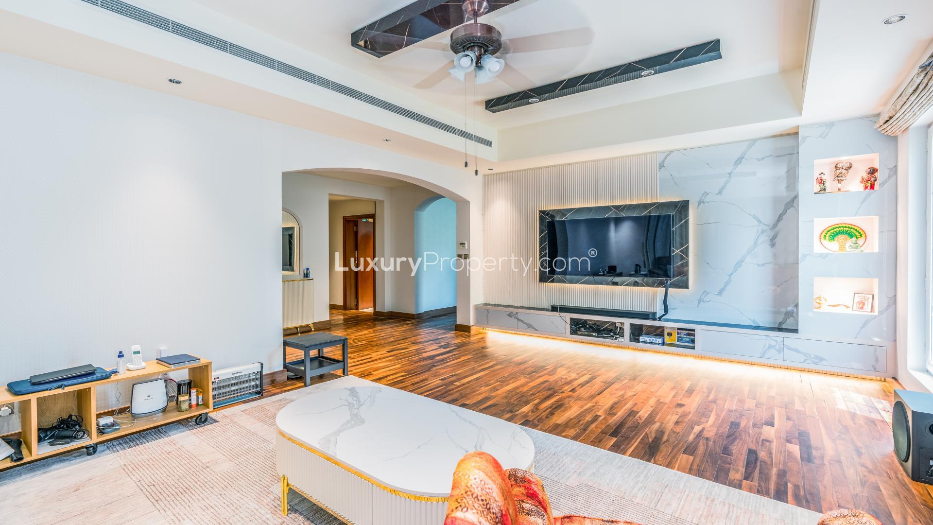 Luxurious villa exterior in Mirador La Coleccion, Arabian Ranches, with lush garden landscaping