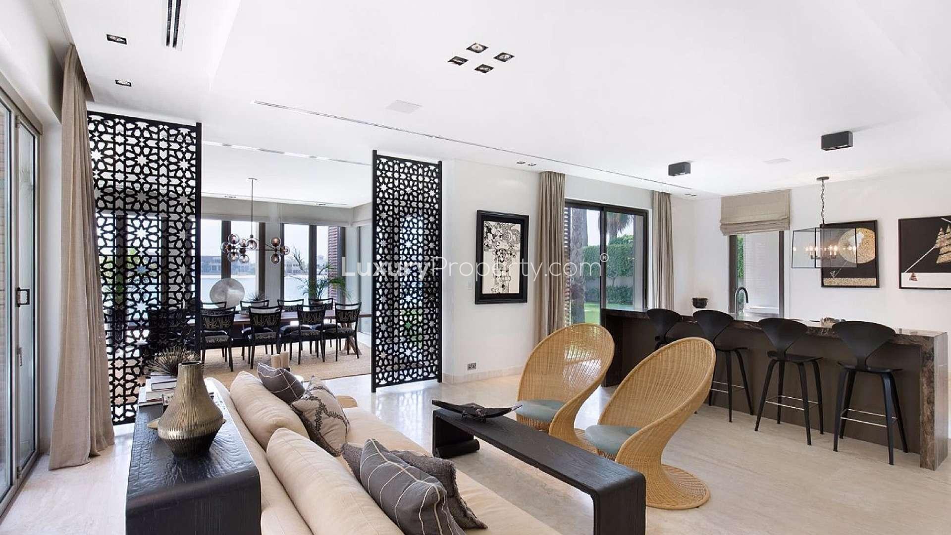 Luxurious dining room with sea view in Palm Jumeirah beachfront villa, Dubai