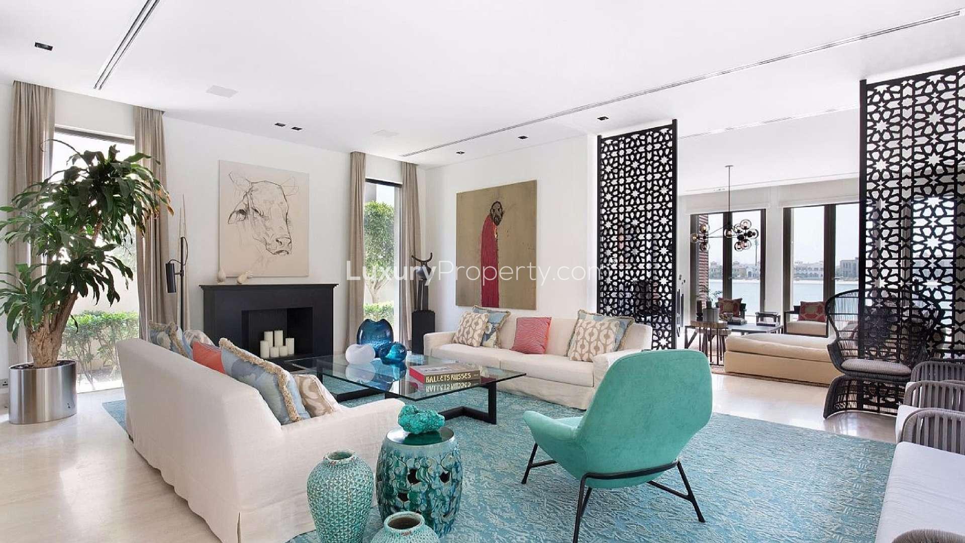 Luxurious beachfront villa exterior with pool, Palm Jumeirah, Dubai, for sale