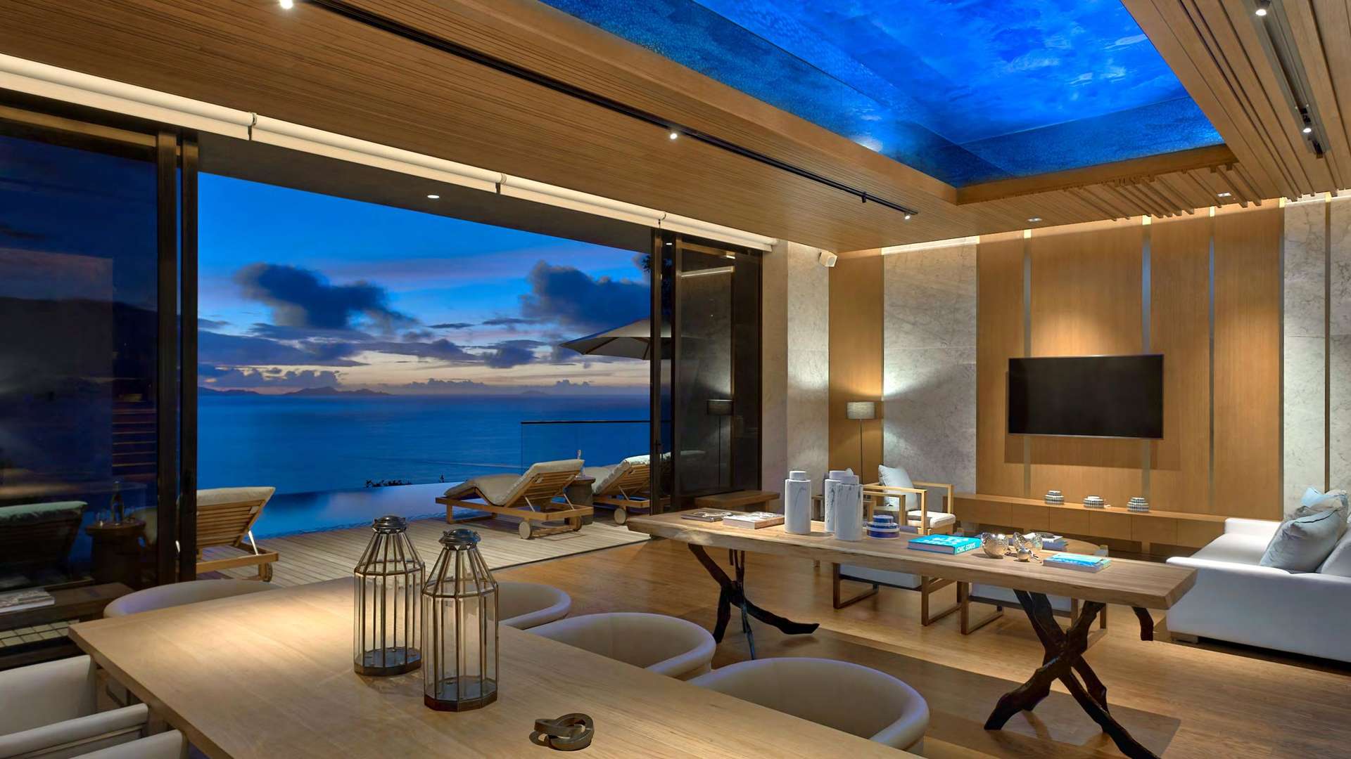 Luxurious villa interior at Six Senses, Seychelles, featuring ocean view and modern decor