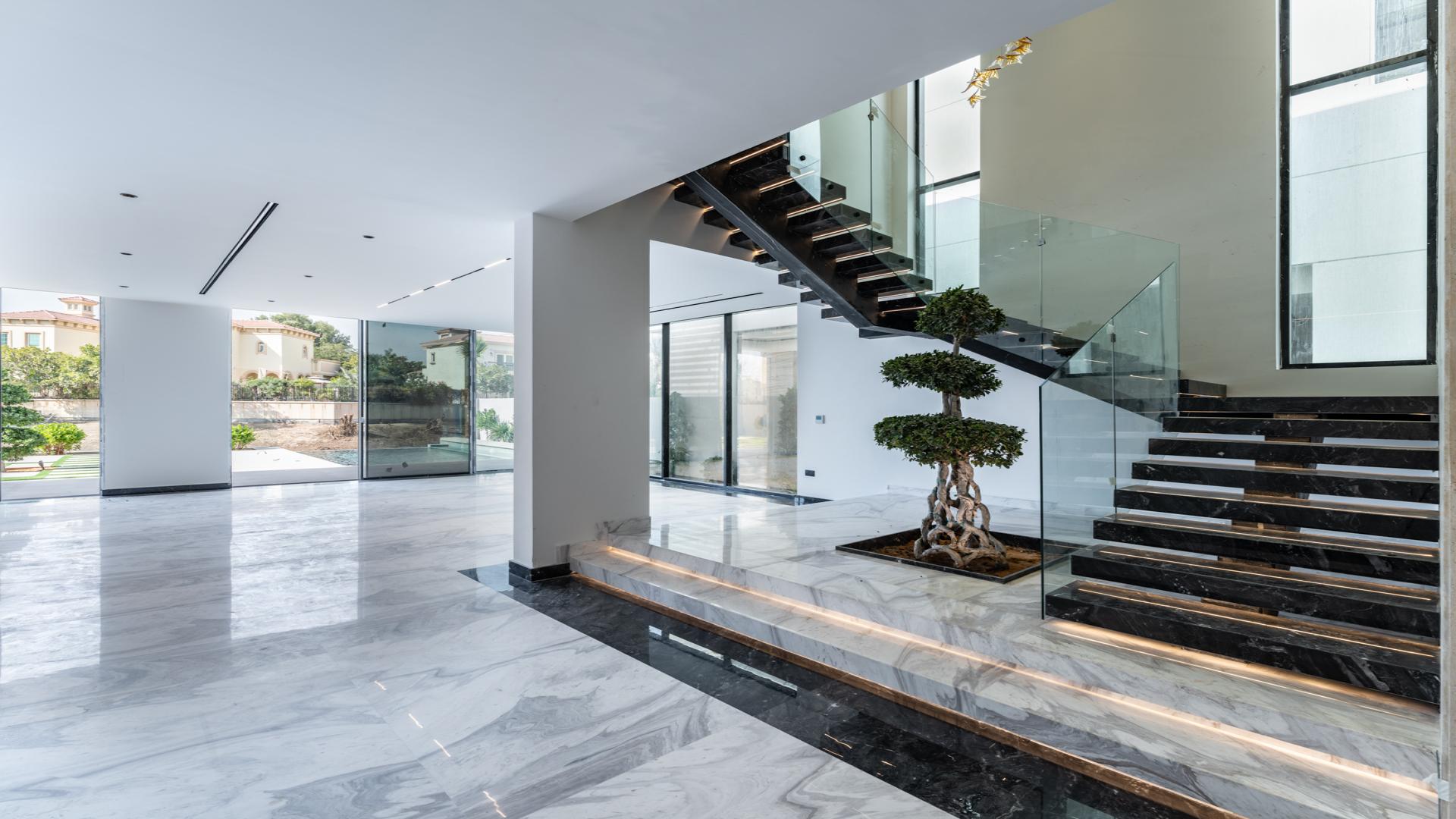 Luxurious marble bathroom with modern fixtures in Jumeirah Park 5-bedroom villa