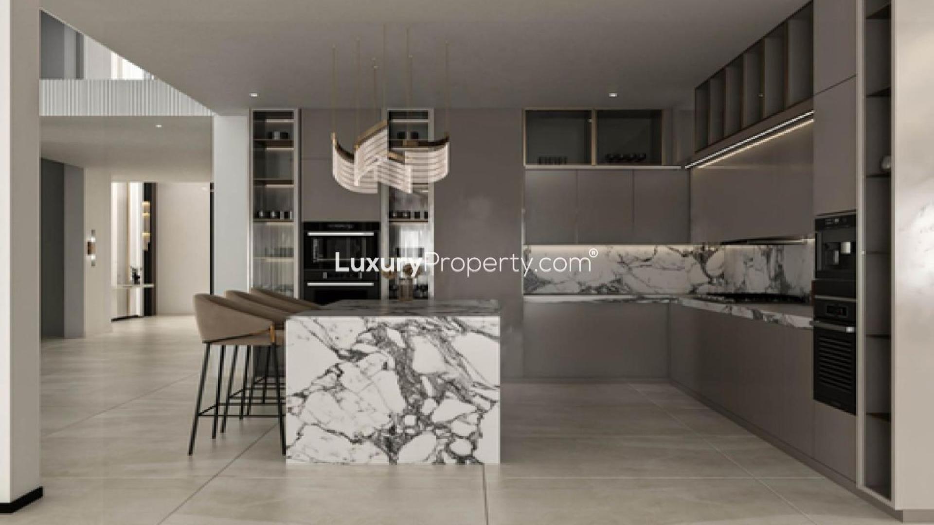 Luxurious modern kitchen in custom-built Asora Bay waterfront villa, Jumeirah, marble island, sleek design