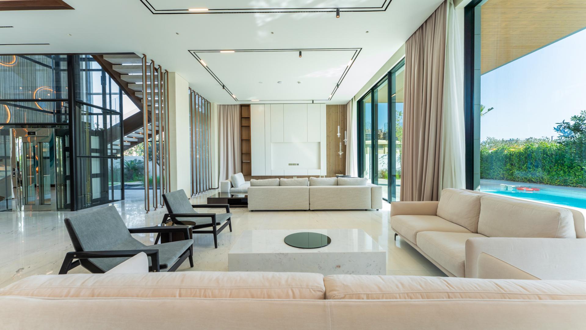 Luxurious modern villa interior with elegant lighting in La Mer, Jumeirah for sale