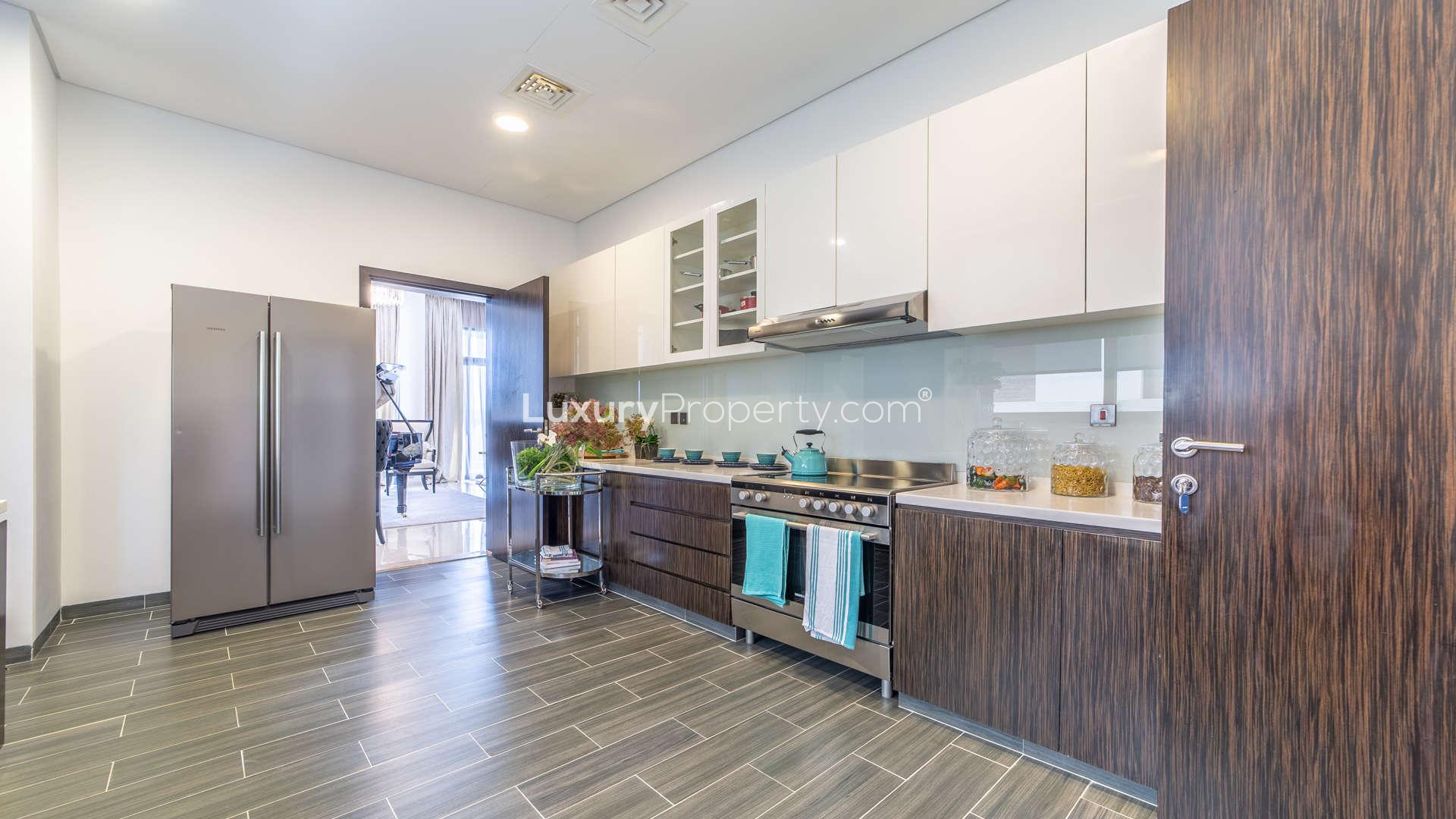 Luxurious living room in 5-bedroom villa, Flora, Dubailand, with elegant piano and decor