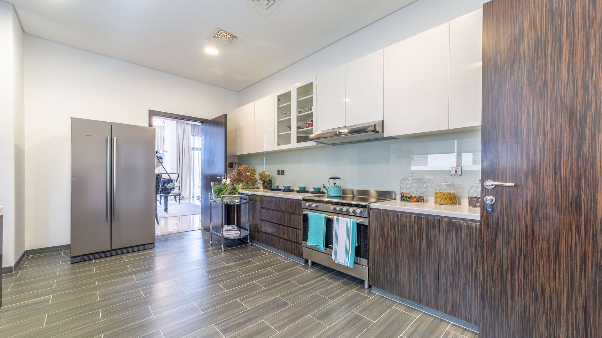 Luxurious living room in 5-bedroom villa, Flora, Dubailand, with elegant piano and decor