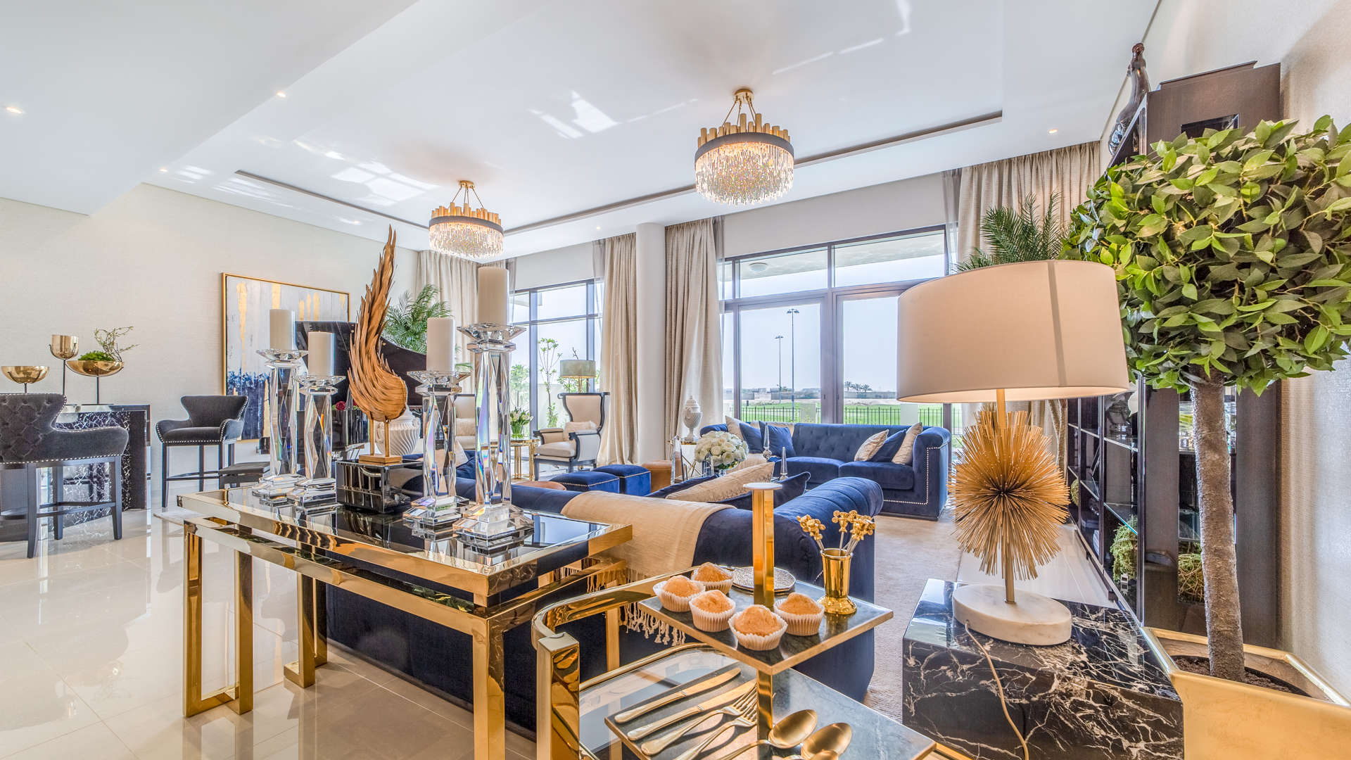 Luxurious living room in 5-bedroom villa, Dubailand, with elegant decor and grand piano