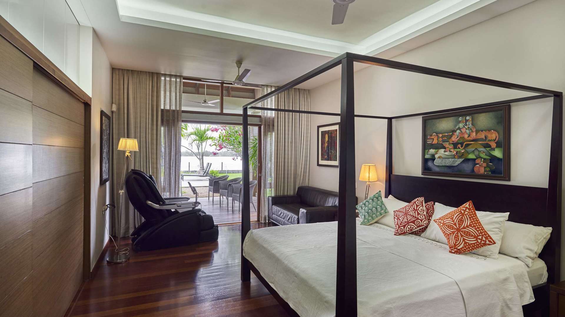 N/A,Cozy bedroom interior in Kariath Residence villa, Kochi with modern decor and warm lighting