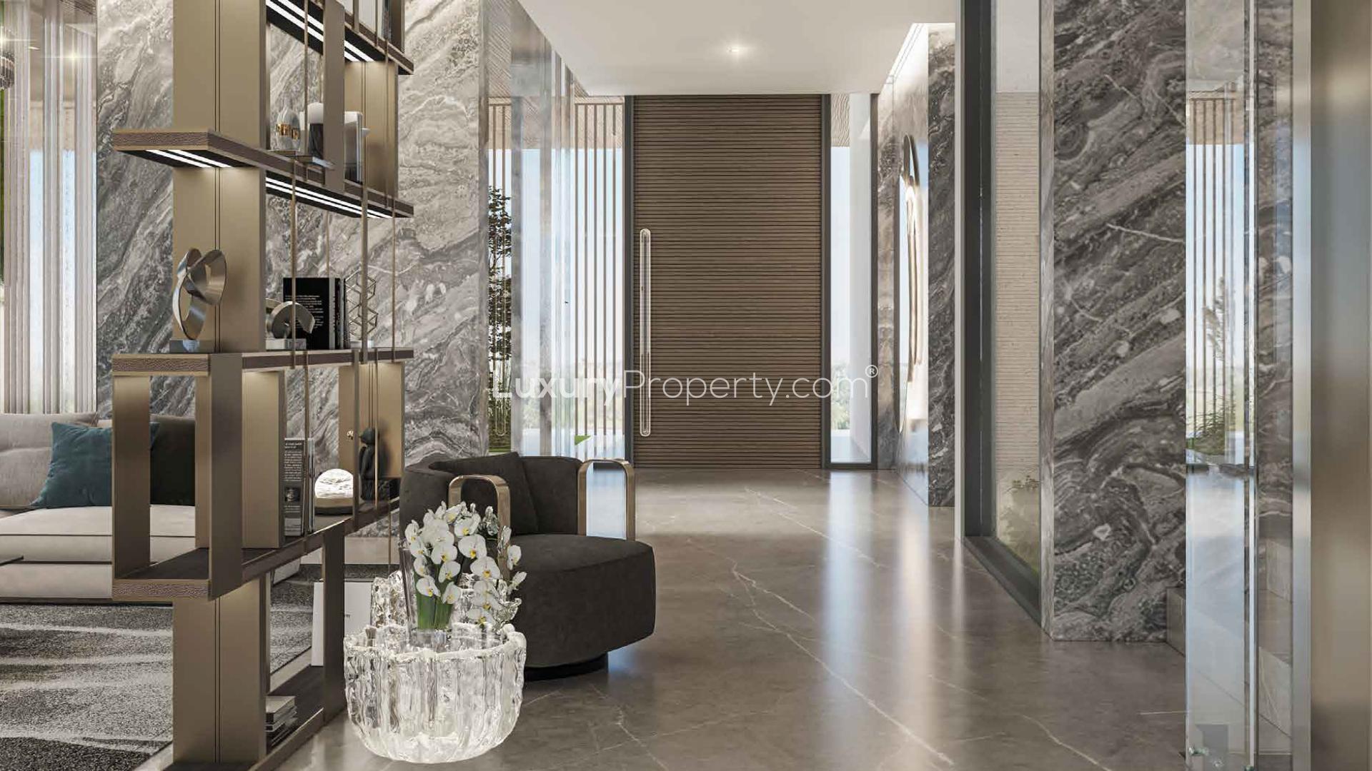 Modern 5-bedroom villa exterior at night, Utopia Damac Hills, for sale