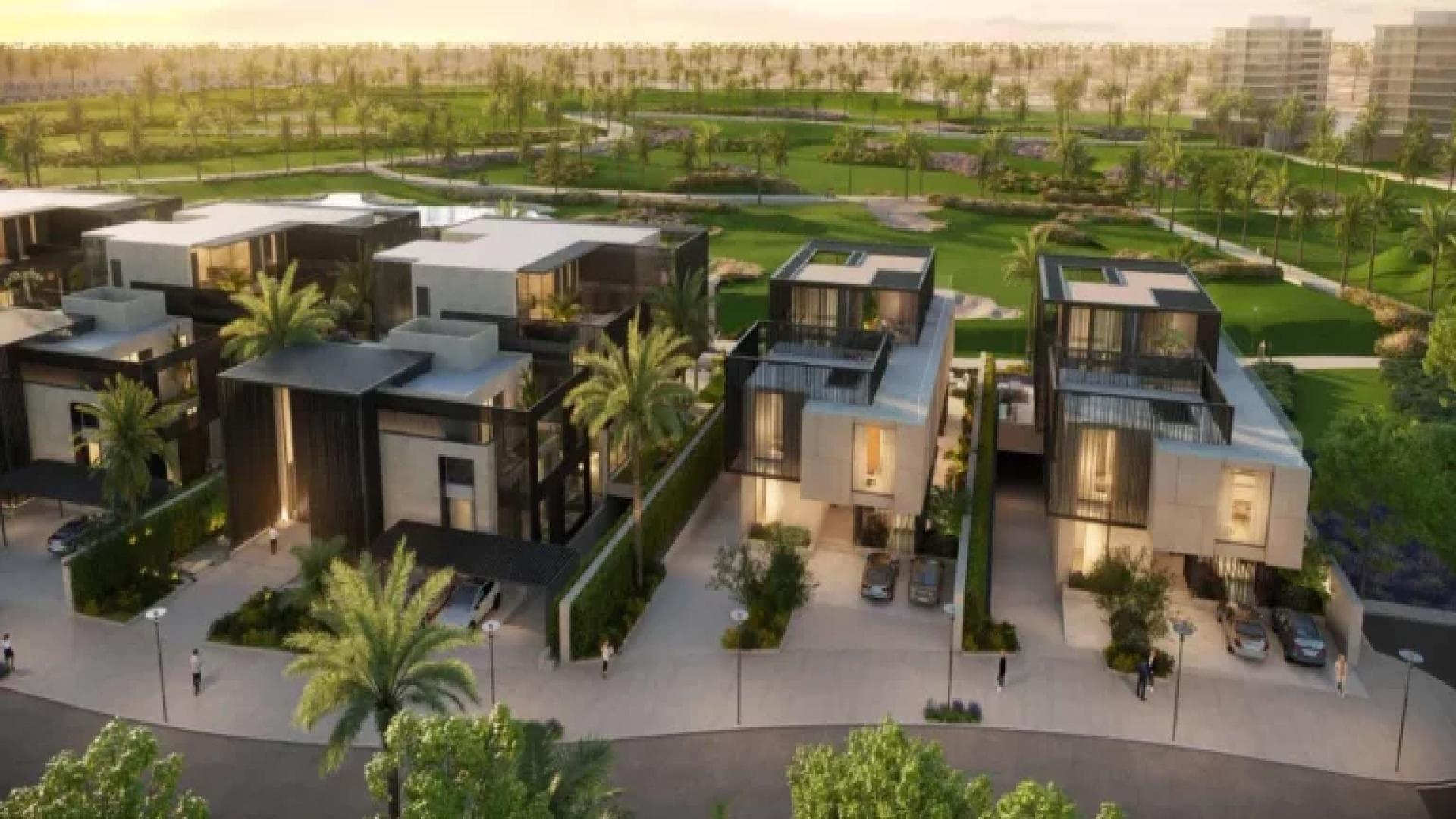 "Modern 5-bedroom villa exterior at dusk in Utopia DAMAC Hills, lush surroundings, luxury property.",Premium 5-bedroom villa overlooking golf course in Utopia, DAMAC Hills community