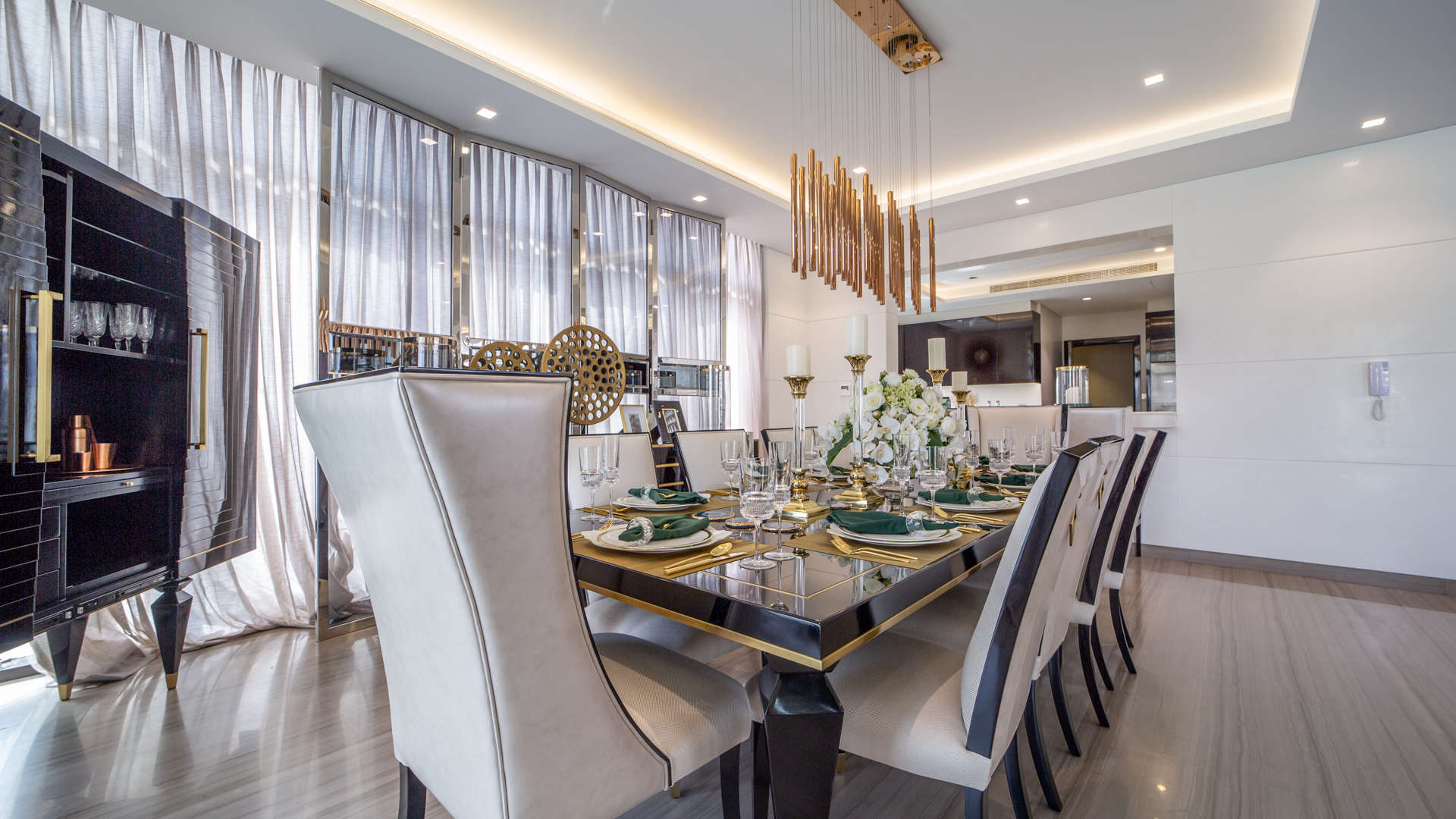Elegant dining room in Trump Estate Villa, Damac Hills, with modern decor and natural light