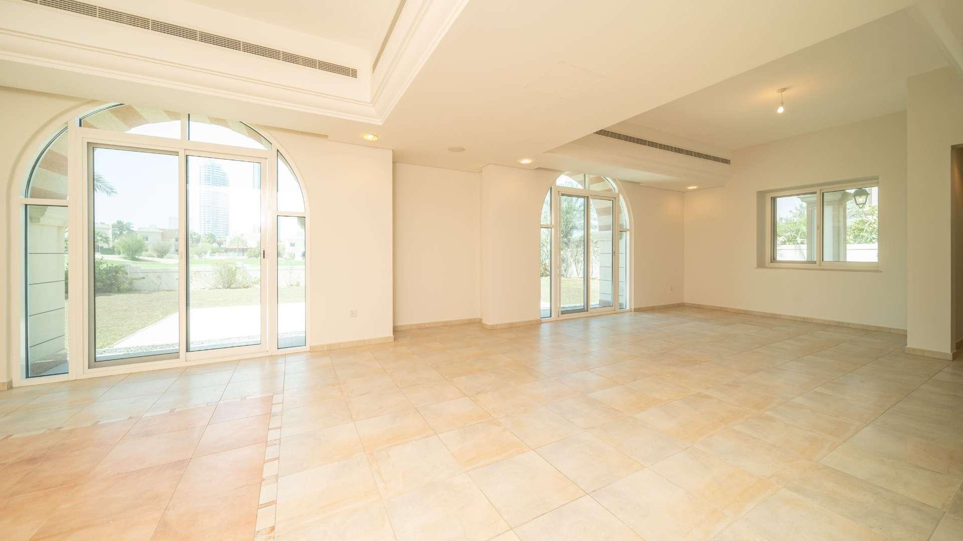 Spacious living area in vacant B1 type villa, Dubai Sports City, Victory Heights