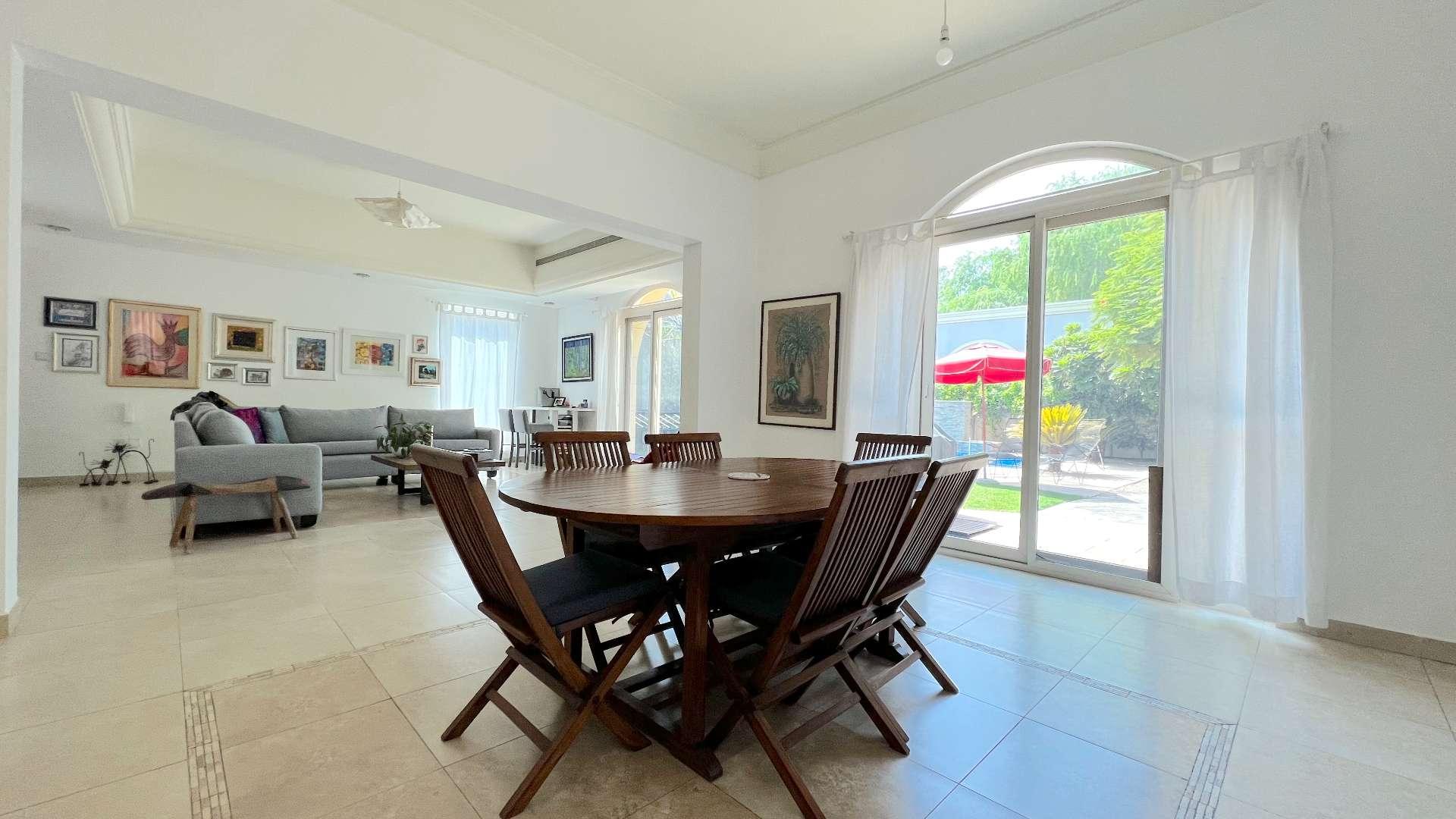 Spacious living room in C1 villa, Victory Heights, Dubai Sports City, with modern decor