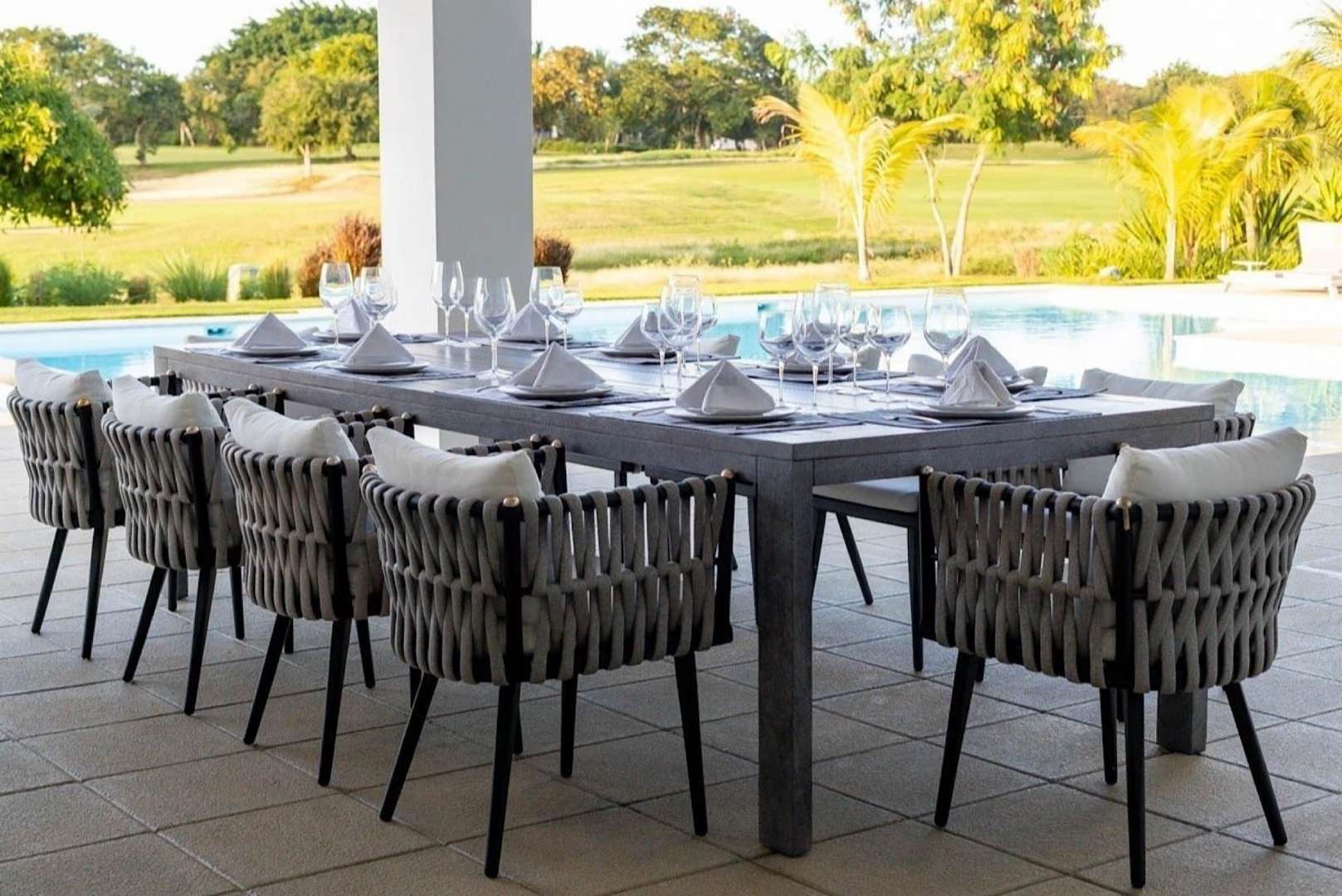 Luxurious living room with pool view in Casa de Campo villa, La Romana