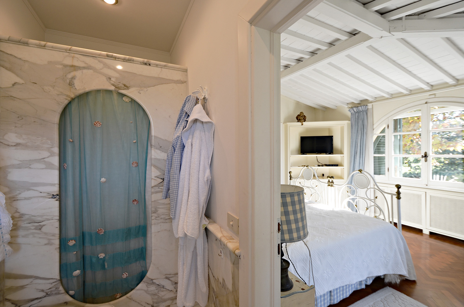 Luxurious bathroom and bedroom in Villa Versilia, Lucca, Italy - elegant vacation home