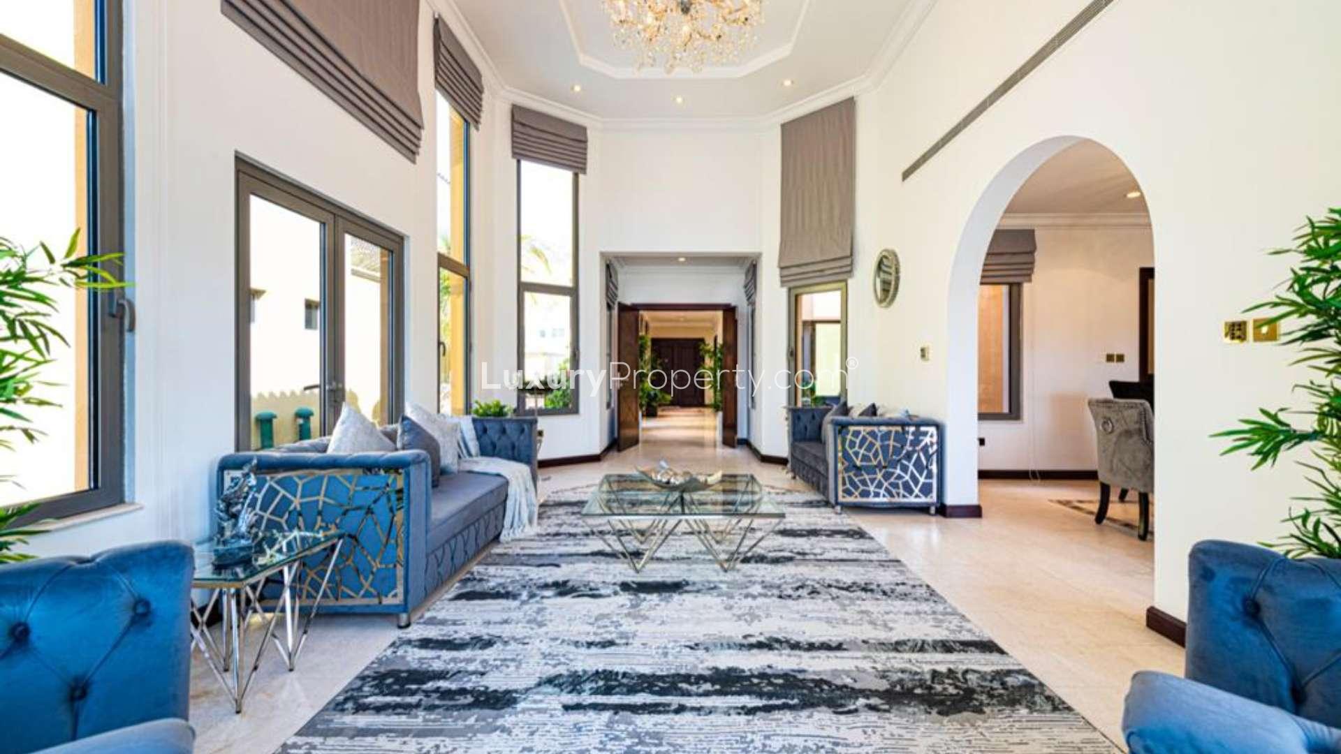 Modern villa interior with elegant staircase and bright living area in Palm Jumeirah