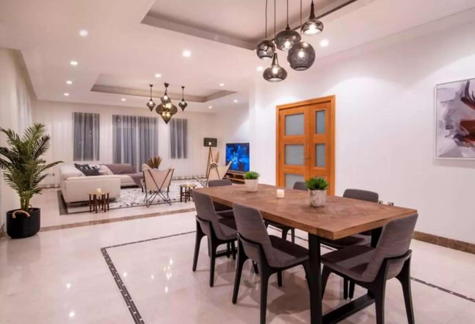 Luxurious living room in Palm Jumeirah Garden Home villa with modern decor and cozy seating