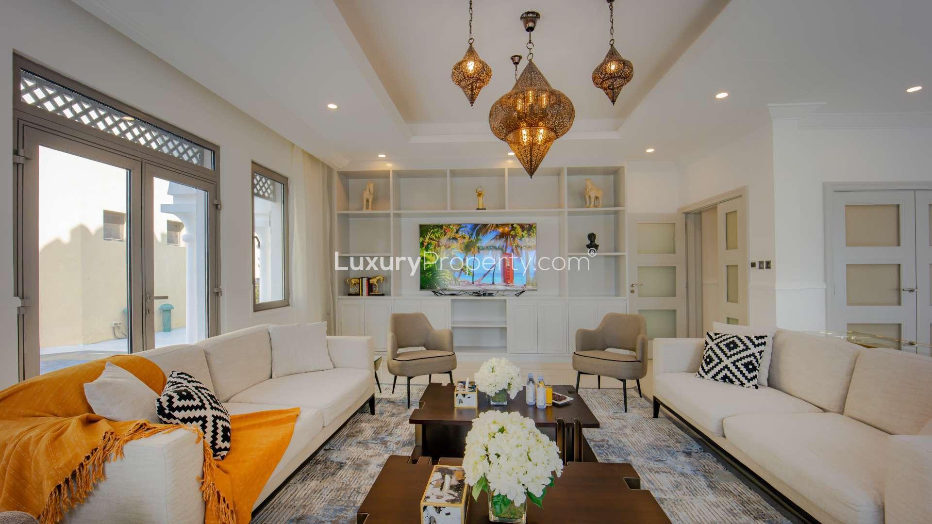 Luxurious living room in upgraded Garden Homes villa, Palm Jumeirah, featuring elegant decor