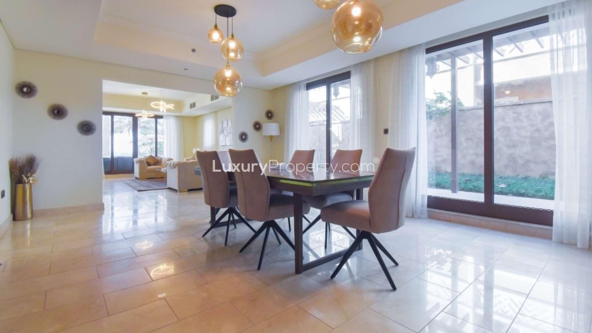 Luxurious living room in Palm Jumeirah villa, elegant decor, modern furnishings, Kingdom of Sheba