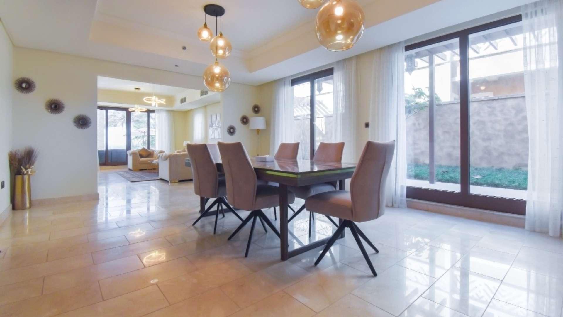 Luxurious living room in Palm Jumeirah villa, elegant decor, modern furnishings, Kingdom of Sheba