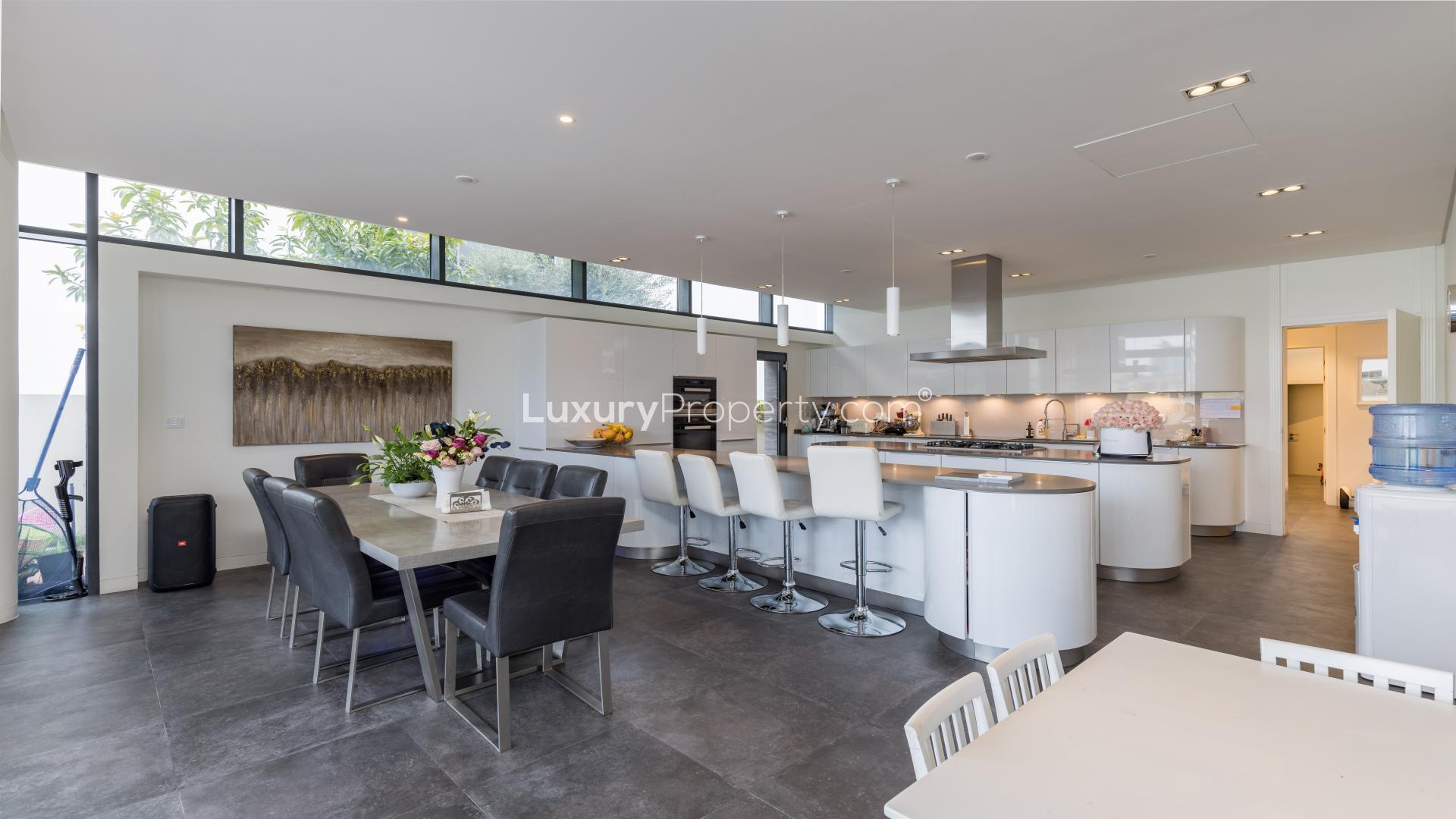 Luxurious living room in five-bedroom Palm Jumeirah villa with waterfront view, Garden Homes