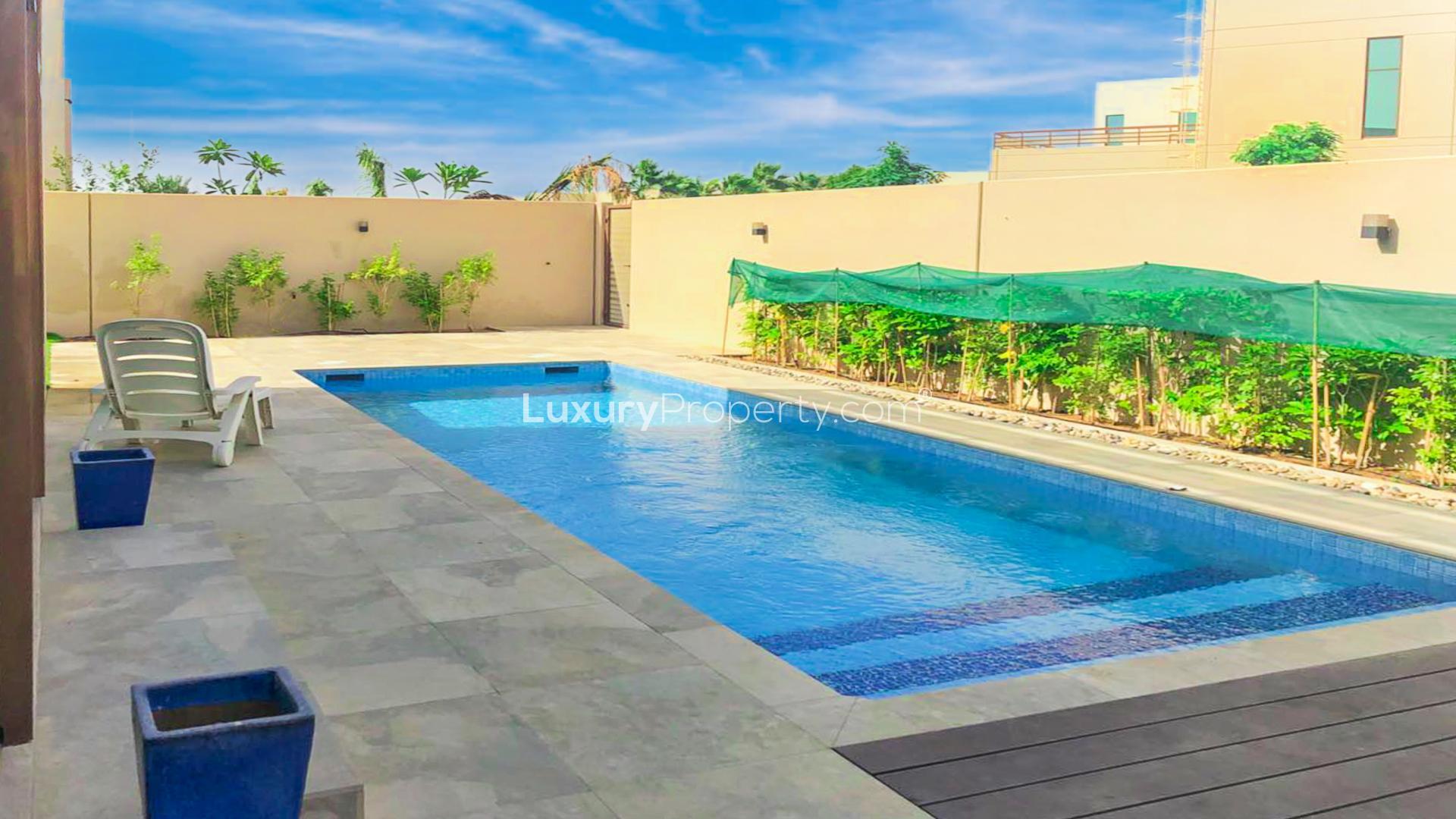 Luxurious Meydan villa garden with lush lawn and trees, Millennium Estates, 5-bedroom property