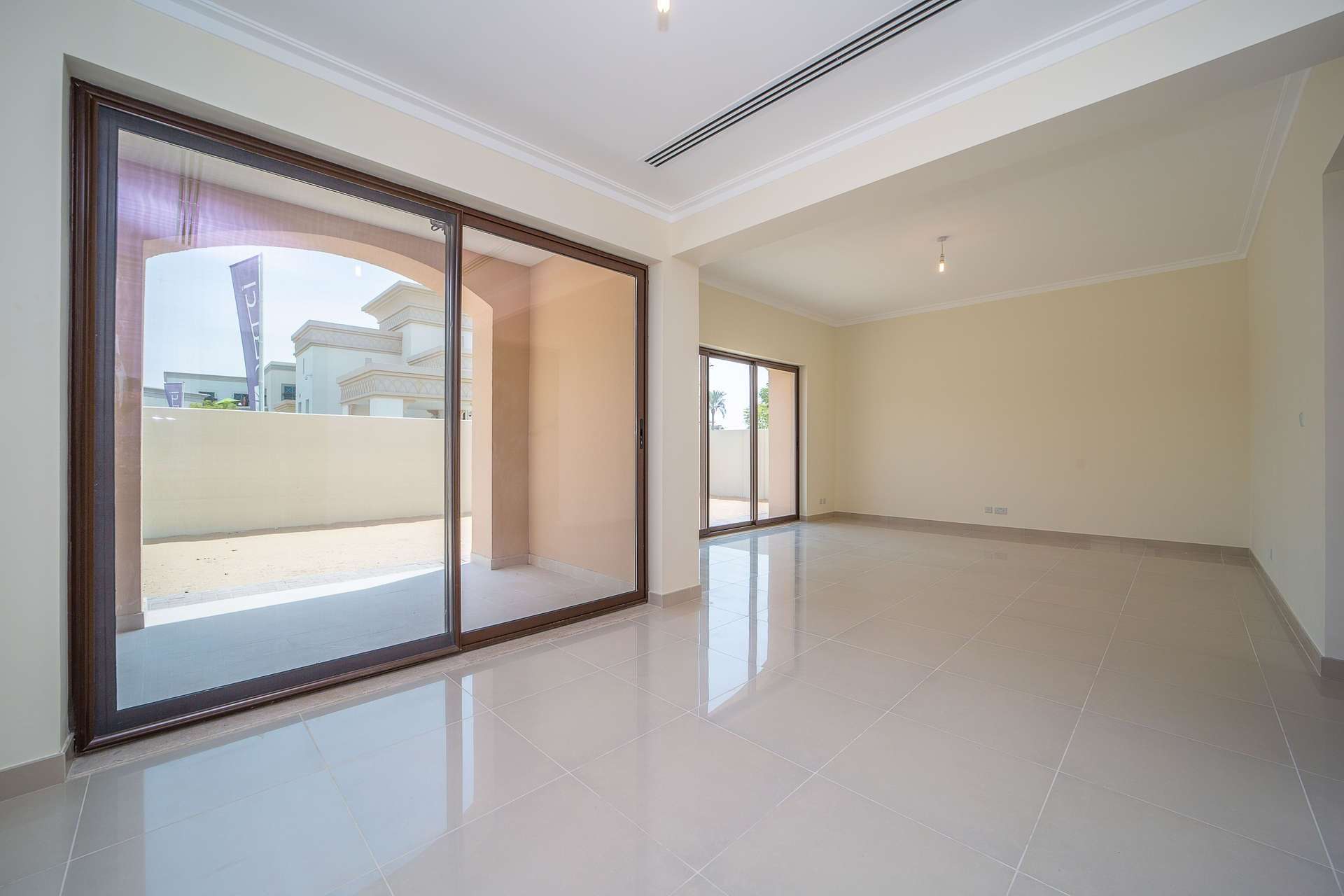 Empty bedroom with window, tiled floor in Samara villa, Arabian Ranches 2, for sale