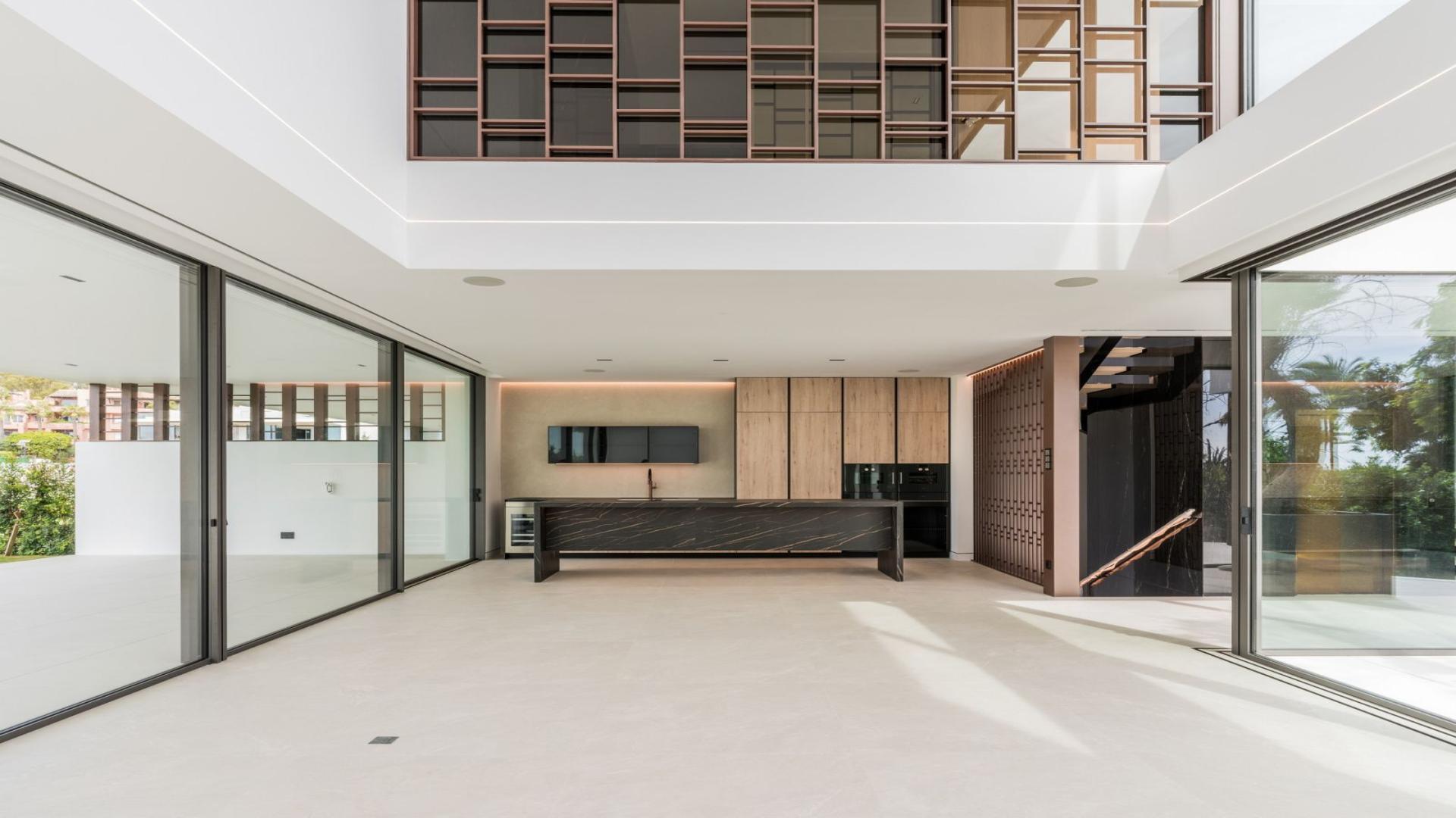 Semi-detached villa in Nueva Andalucía, Marbella with pool and modern architecture