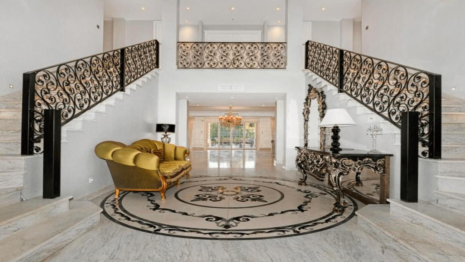Luxurious living room in 8-bed villa, Cascada Camoján, Marbella with elegant decor and chandelier