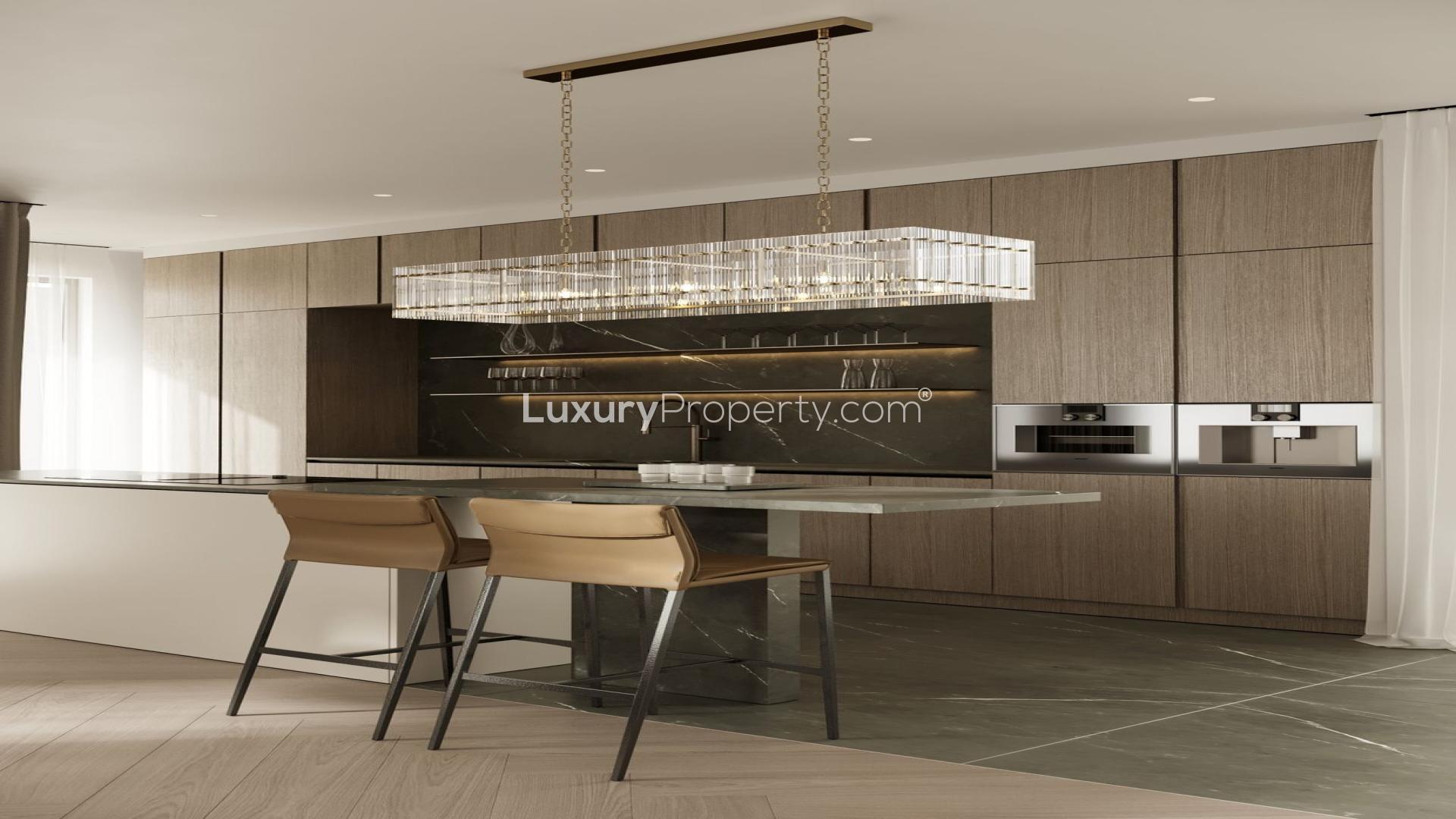 Modern living room in luxury Marbella villa with elegant decor and fireplace on Golden Mile