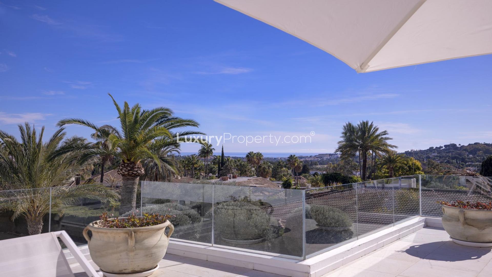 Aerial view of luxury villa with pool and tennis court in Nueva Andalucía, Marbella