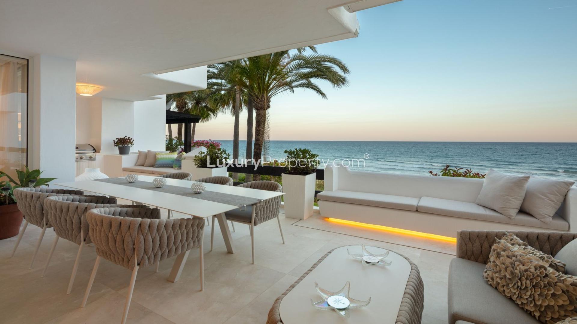 Beachfront penthouse terrace with private pool and ocean view in Puente Romano, Marbella